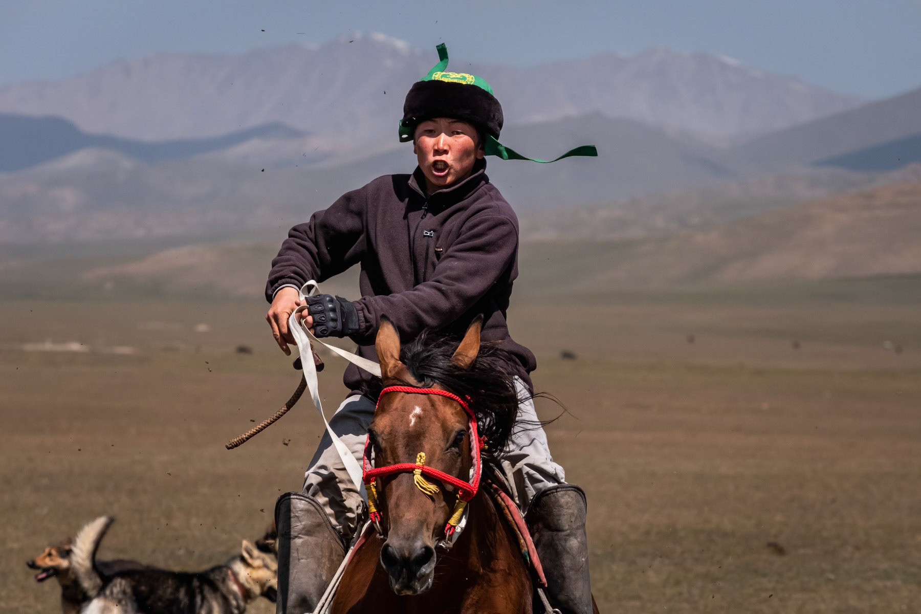 Kok Boru, or Buzkashi in Afghanistan, is a Central Asian sport in which horse-mounted players attempt to drop a goat carcass in a goal. In Kyrgyzstan where itbis the National sport it is widely played among the nomadic communities, but there is also a professional league. Usually the size of the playing field depends on the number of participants. Nowadays games similar to Kok Boru are played by several Central Asian ethnic groups. Kok Boru player during a game between Naryn and Koshigor. Son Kul Lake, Kyrgyzstan, August 2021
