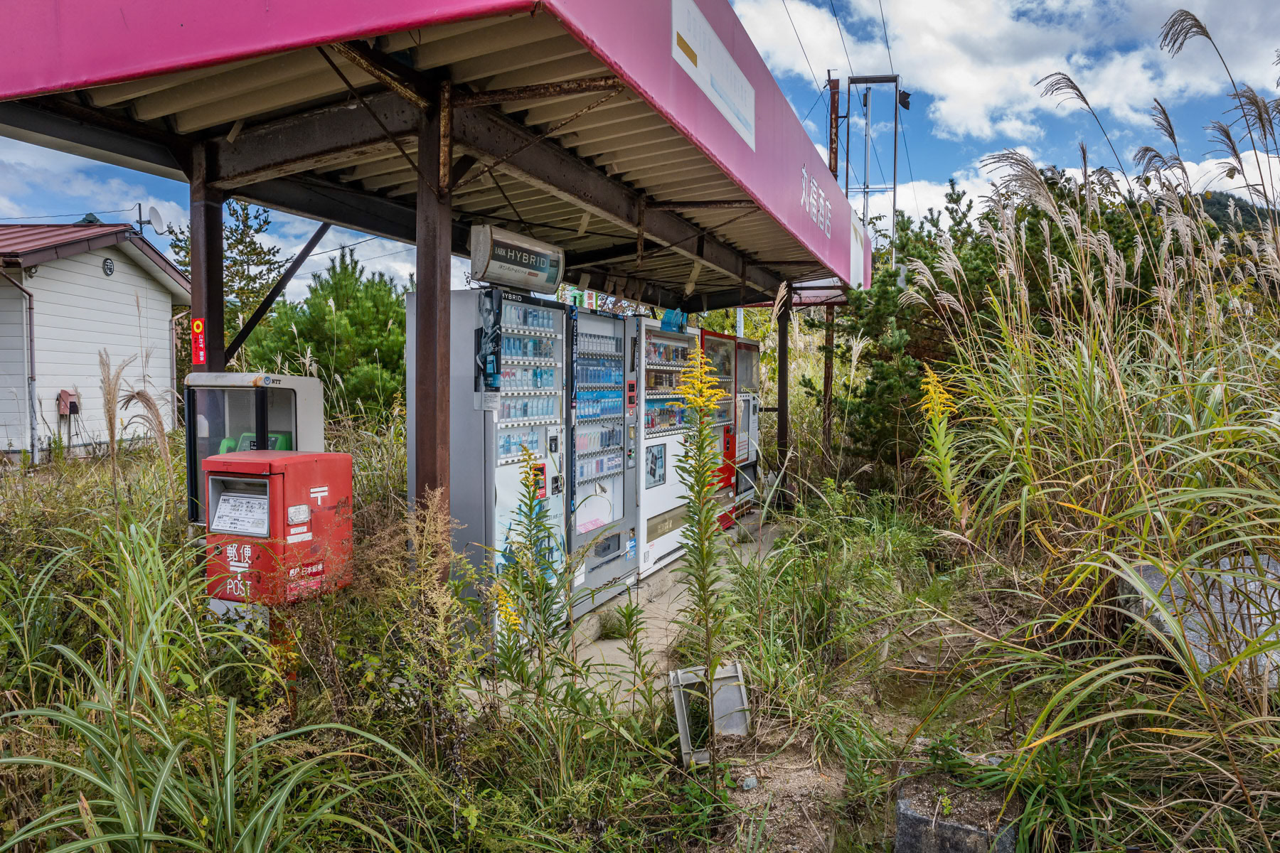 Abandoned buildings and settlements along route 114 crossing the mountains. The entire area in the woods and mountains are no go zones as radiation levels are still to high. Those areas in the hinterland will most likely remain off limit forever. Fukushima Prefecture, Japan, October 2019