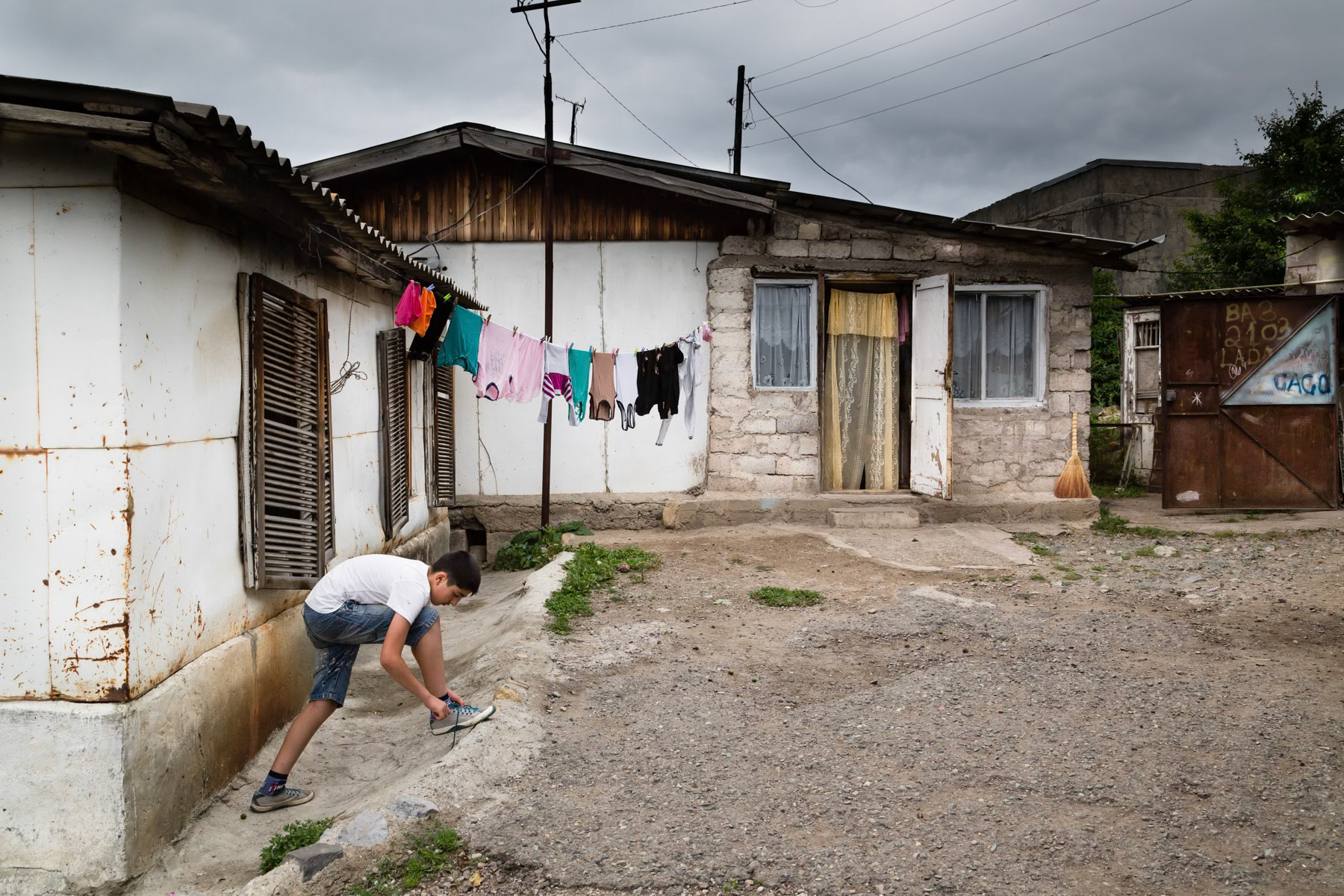 Buzum domik neighbourhood is different of other domik settlements, here the majority of residents want to remain rather than moving away. Originally built by Bulgaria in the aftermath of the 1988 earthquake, the domiks are of better quality and constructed on foundations. Vanadzor, Armenia, July 2014
