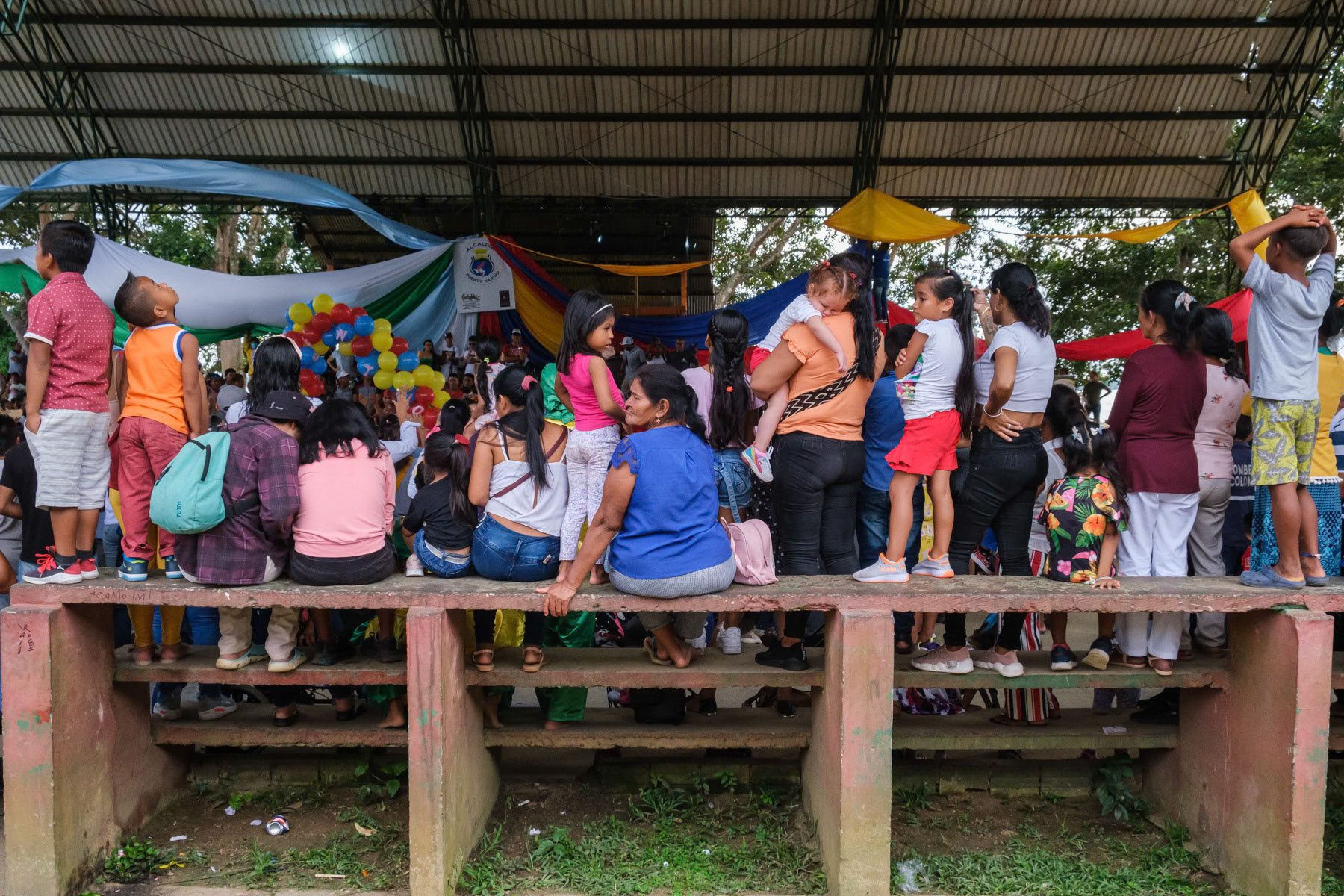 Anniversary celebration in small town of Puerto Nariño along the Amazon river. The town is only accessible by boat and is mainly populated by indigenous people living in perfect harmony with the Amazon rainforest and its rivers. Puerto Nariño, Amazonas, Colombia, April 2022