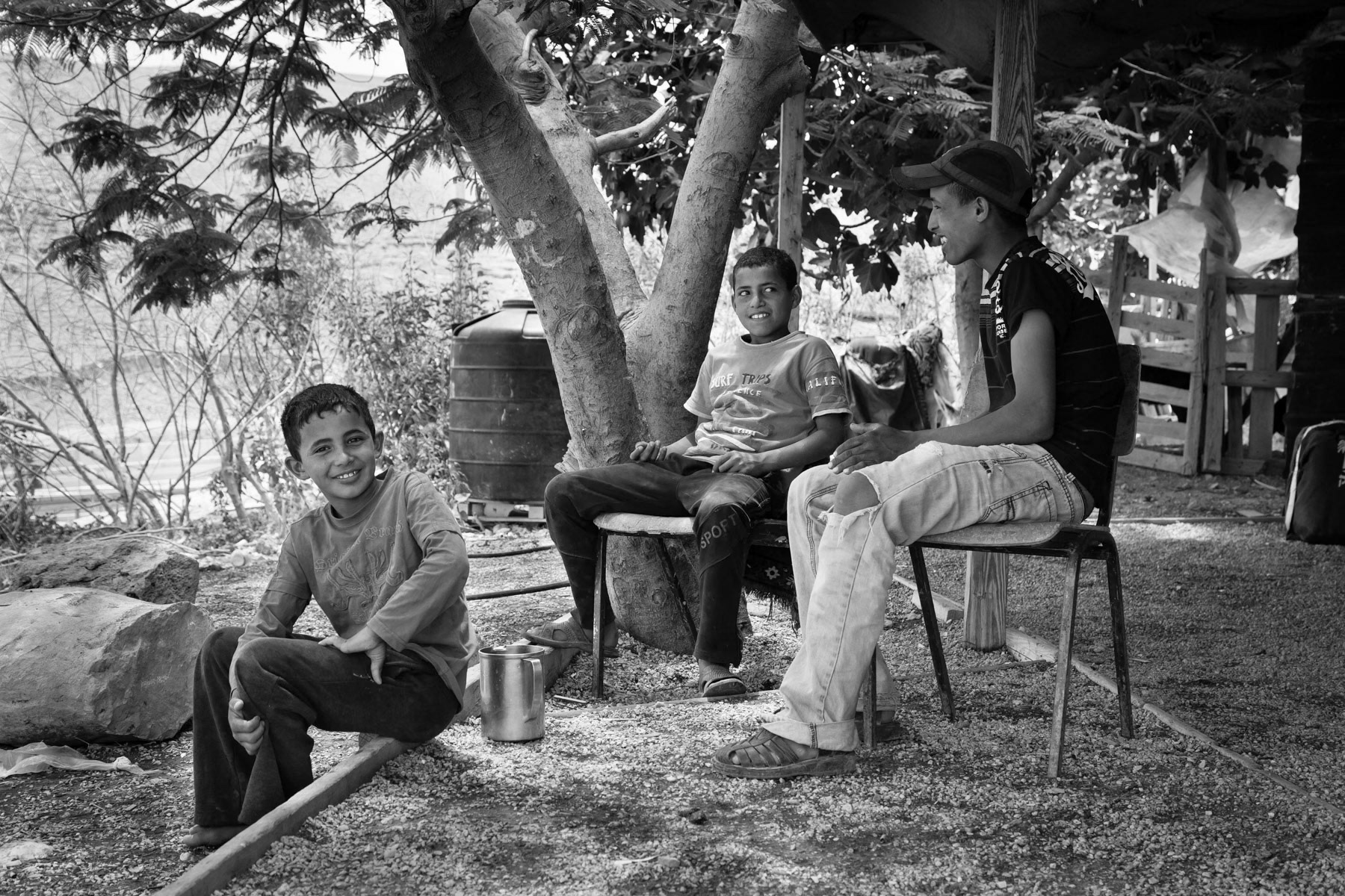 Friends taking a rest from the sun, Khan Al Ahmar settlement. May 2014