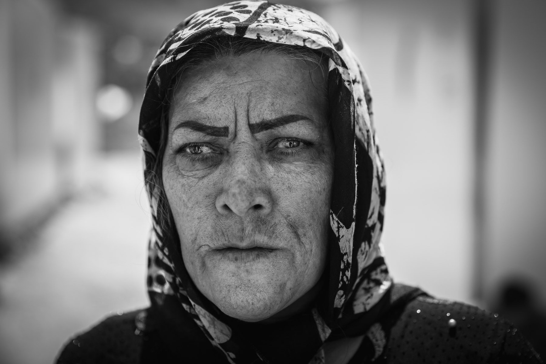 Victim of a chemical attack on the village at the end of the Iran/Iraq War in 1988. Even 30 years ater the attack she has permanent damaged eye-sight and frequent headaches. Zardeh, Kermanshah Region, Iran, April 2018