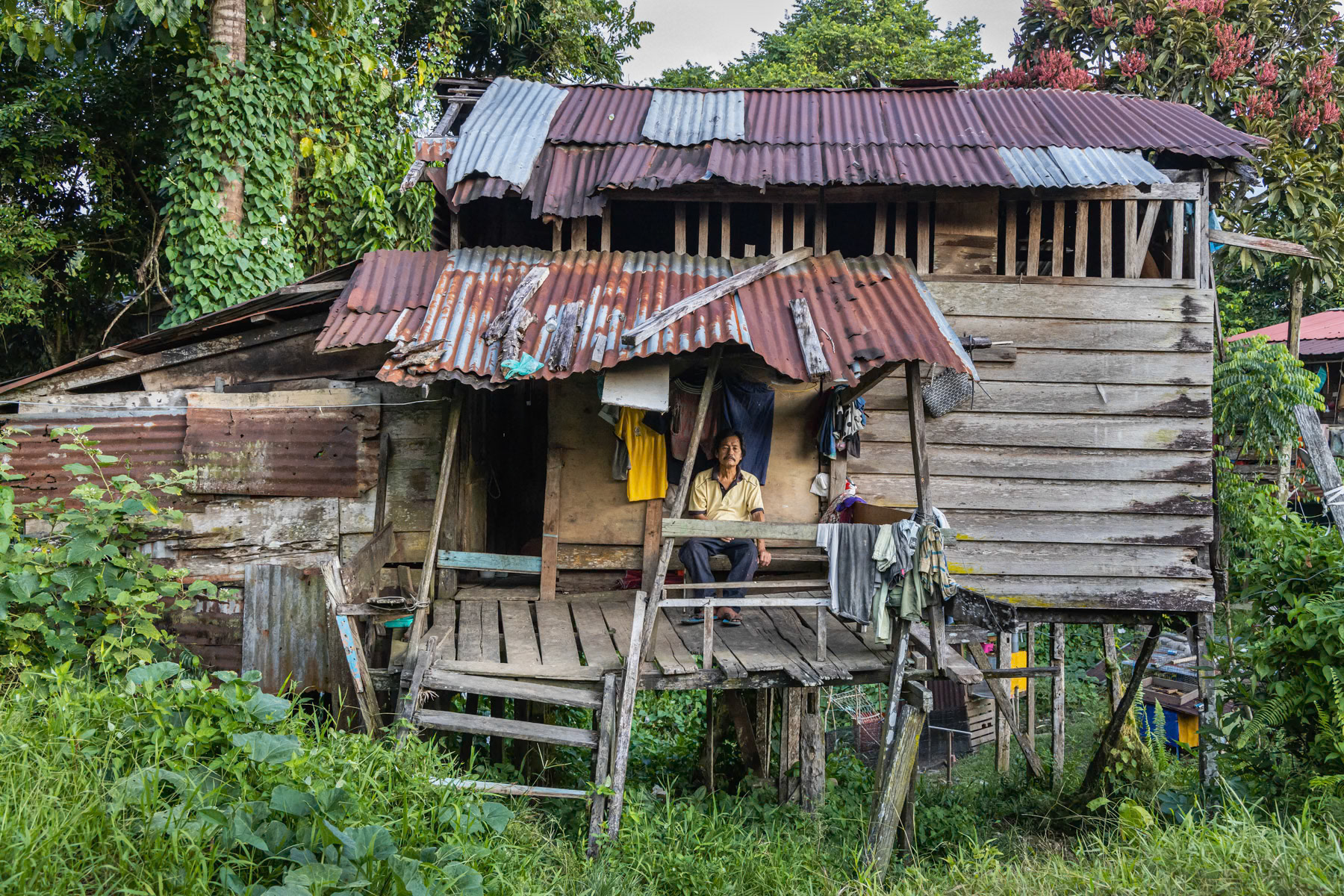 Resident of Belaga, an outpost town at the edge of the rainforest of Borneo and inhabited by several indigenous tribes that have been re-settled there during the past decenia. Belaga town, Sarawak, Malaysia, June 2022