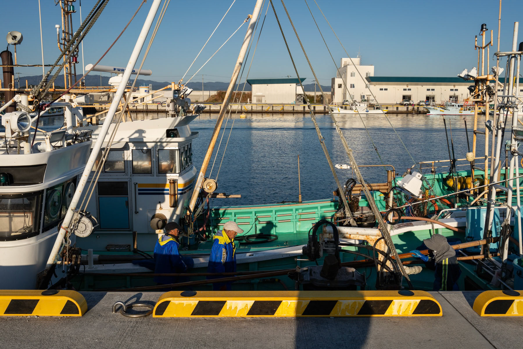 Fishermen in the fishing port of Tomioka near the Fukushima Daichi nuclear power plant. Tomioka, Fukushima, Japan, October 2023