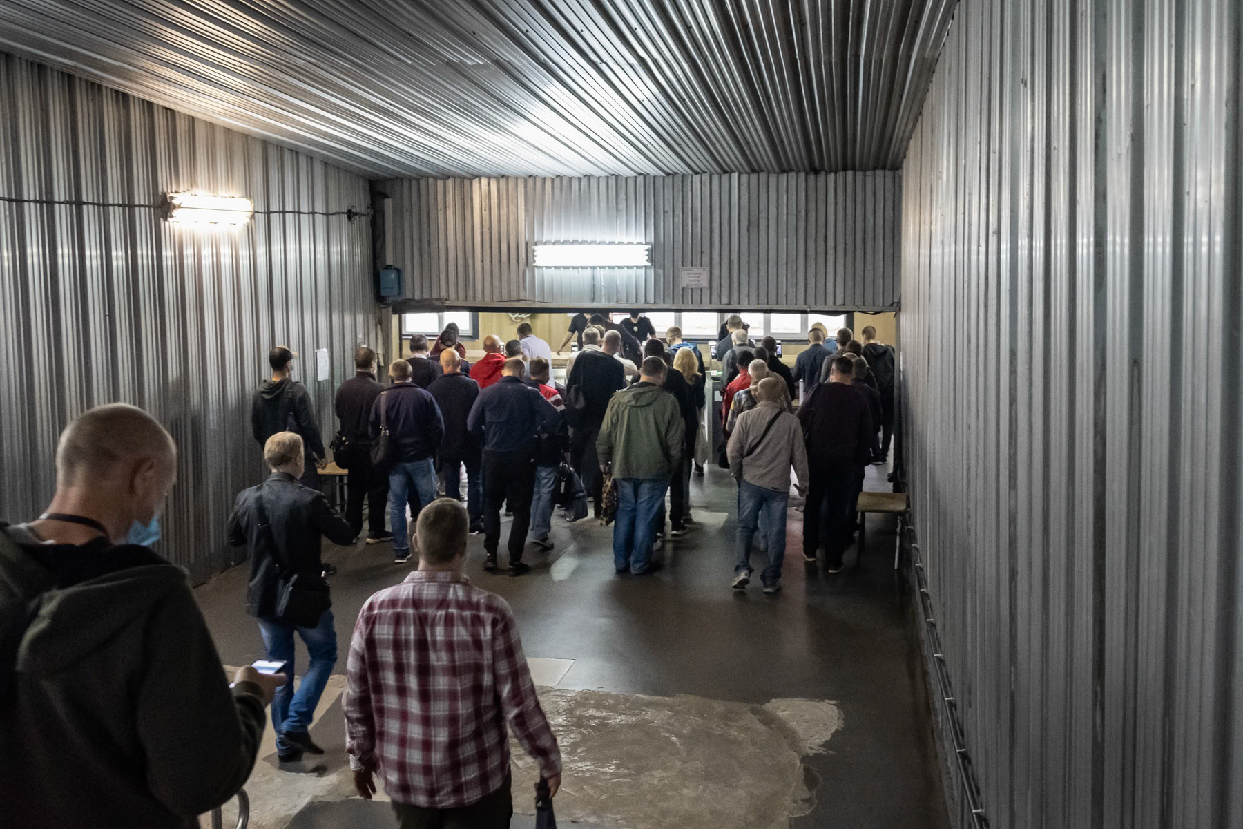 Workers arriving at the Chernobyl NPP railway station. Daily trains bring workers to the nuclear power plant from Slavutych, 45 minutes away out of the exclusion zone. Chernobyl NPP railway station, Ukraine, August 2021