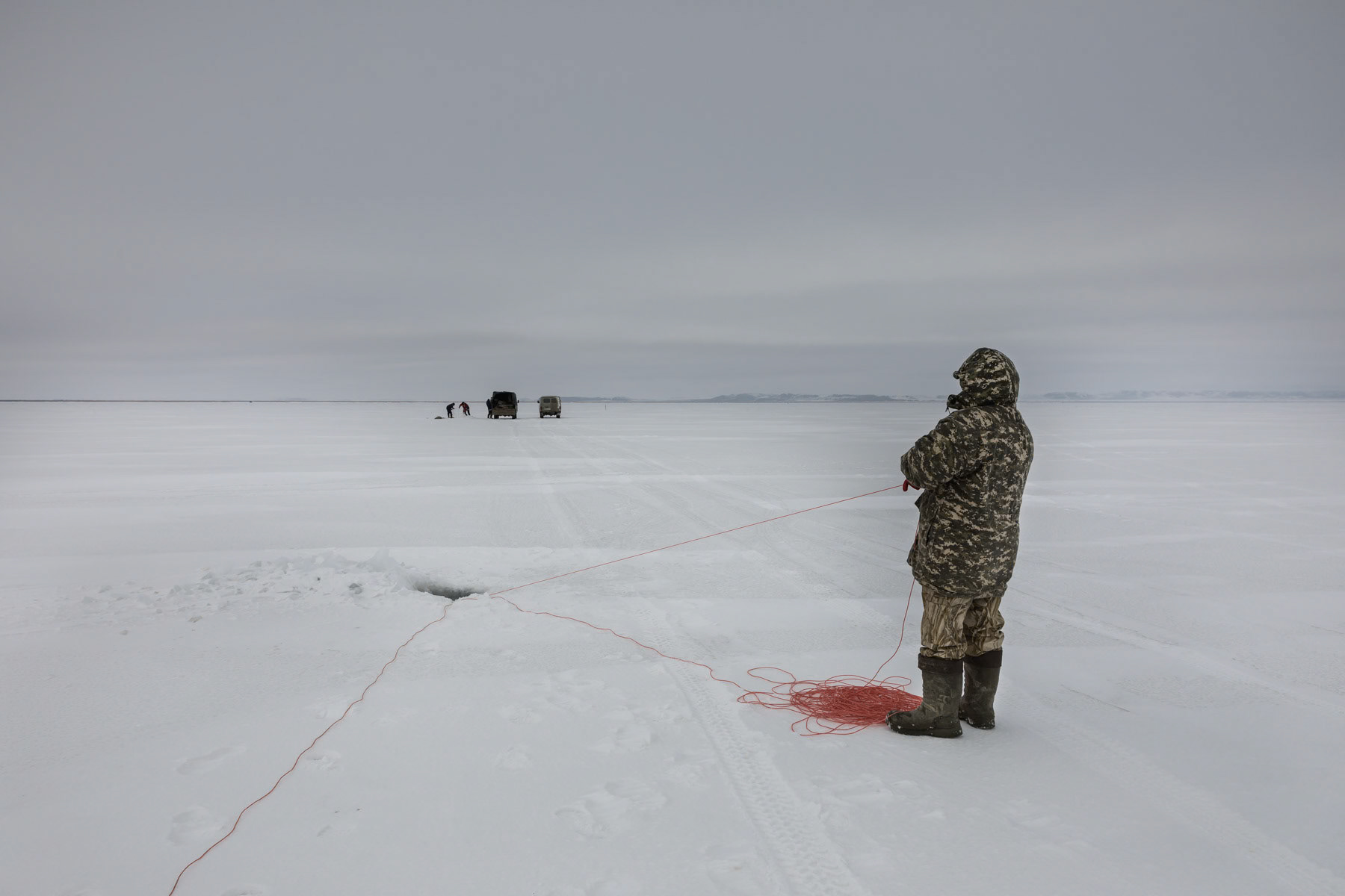 Pulling the fishing nets. Aral Sea, Kazakhstan, January 2019