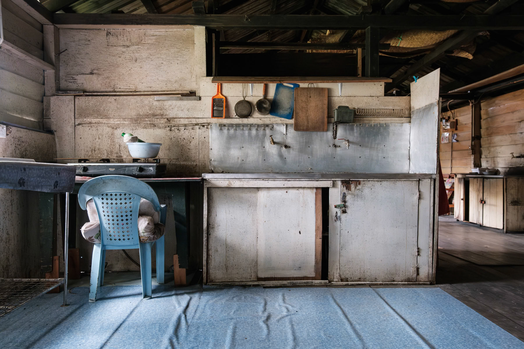 Kitchen of a traditional longhouse, the common habitat of indigenous people in Borneo. Bario, Sarawak, Malaysia, October 2023