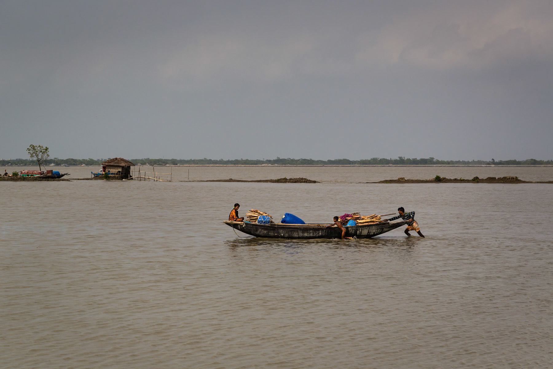 Dhangmari village surrounded by water during the begining of the rainy season, Sundarbans, Bangladesh, May 2015