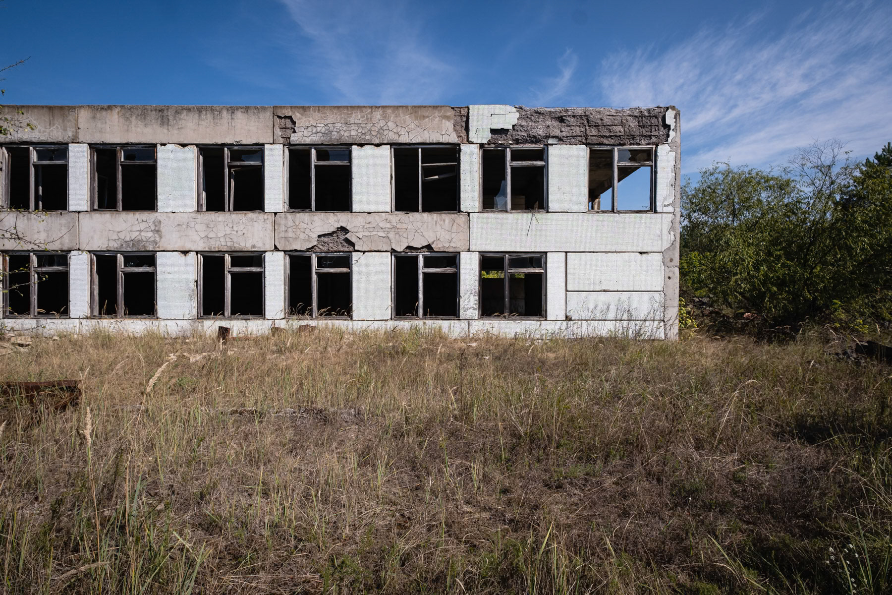 Abandonned administrative building in the evacuated village of Zymovysche. The village is in a highly contaminated area where no people are allowed to live, not even self settlers originally from the village. Chernobyl exclusion zone, Ukraine, September 2021