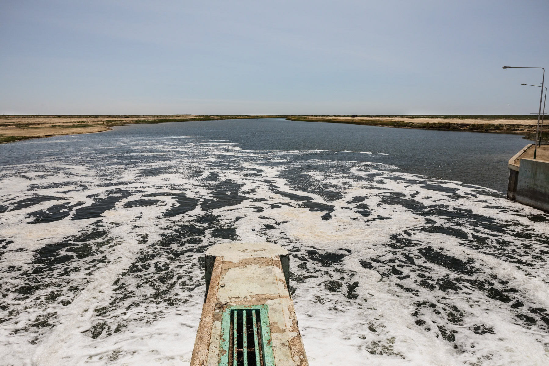 A dam project that was completed in 2005 by the Kazakh autorities with the support of the World Bank. The dam controls the outflow of water and has had the positive effect to preserve what's left and even expand the water volume on the Kazakhstan part of the sea. Aral Sea, Kazakhstan, June 2019