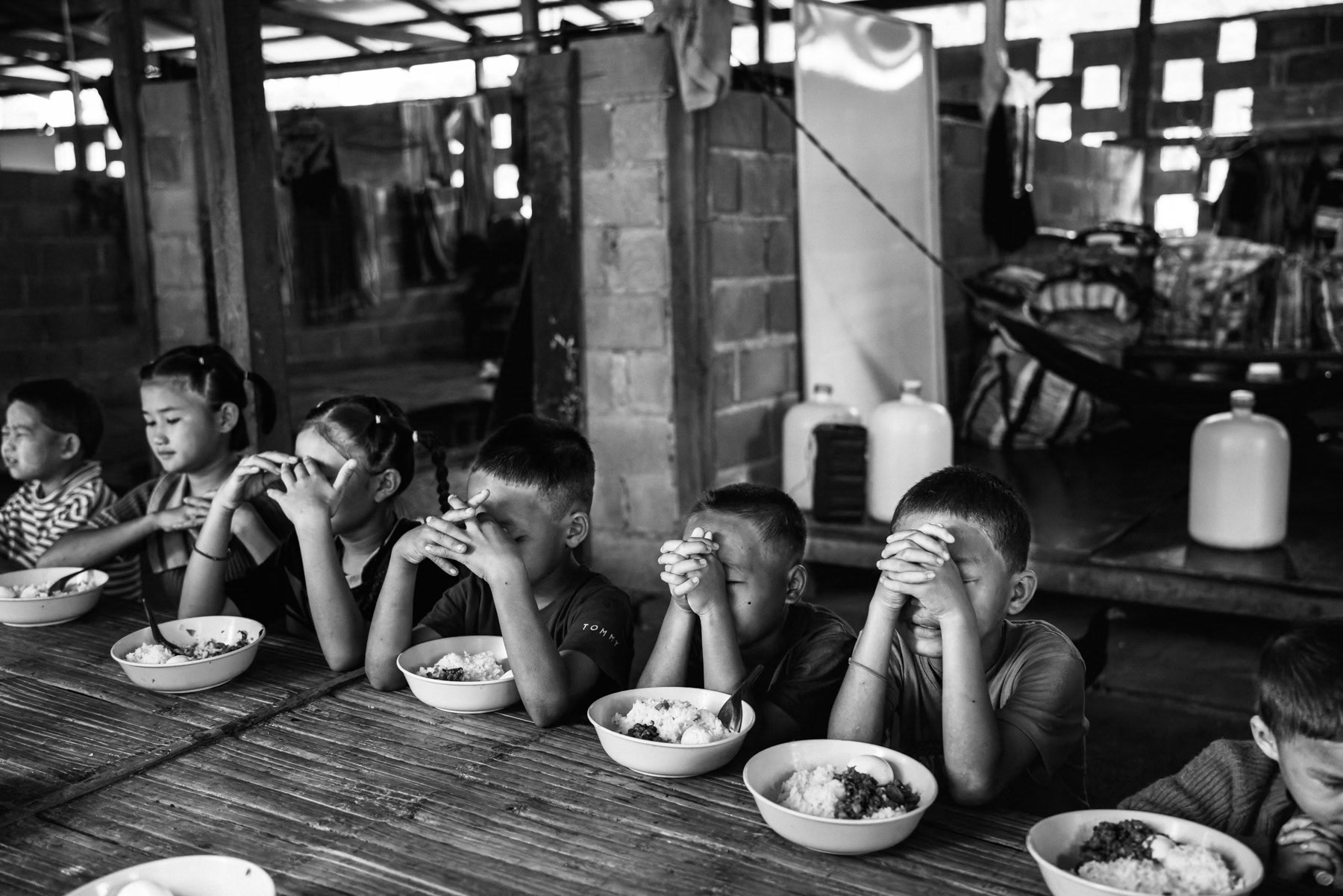 With formal schools under threat from air and ground attacks, Karen families have relocated their children’s education to makeshift sites near the Thai border, where improvised classrooms provide a fragile sense of safety. Htee Baw Kaw, Karen State, Myanmar, October 2025
