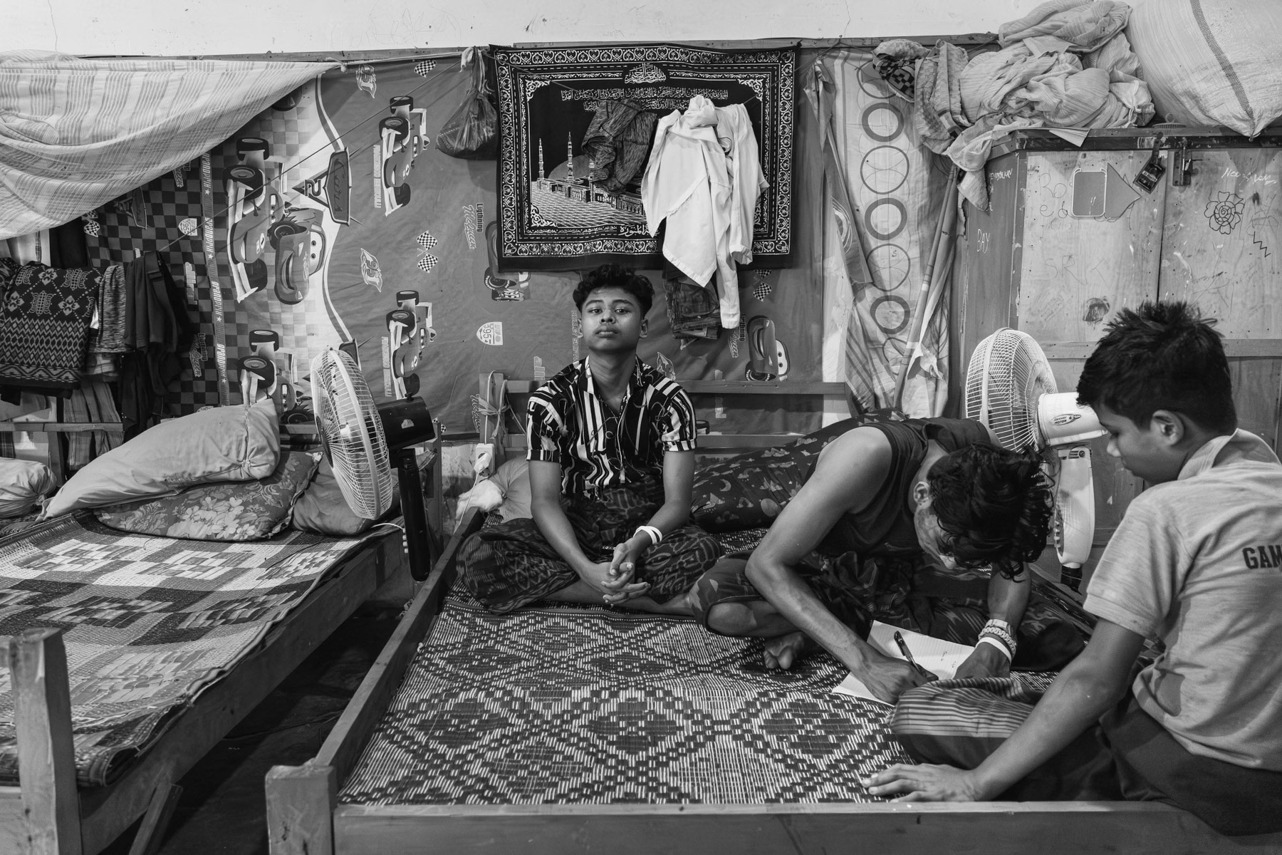 Rohingya stranded in Aceh after having crossed the high seas for several weeks from the southern tip of Bangladesh until reaching Malaysian or Indonesian waters. Achenese communities and Indonesian authorities are the sole country that still accepts them on their shore even though they are kept in shelters of a closed type with very limited freedom of movement. Padang Pijie, Aceh, Sumatra, Indonesia, October 2023