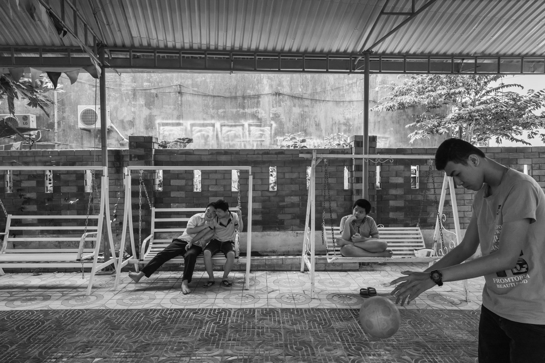 Agent Orange victims in a day care centre managed by the Vietnamese Association for Agent Orange Victims (VAVA). Agent Orange is a chemical defoilant rich in dioxin that was massively used by the American Army in clearance operations during the Vietnam War. Although its use was stopped in 1971, almost 50 years later desendants of affected victims are still born with mental and/or physical problems due to the toxicity of the dioxin passed on through generations. Da Nang, Vietnam, April 2018