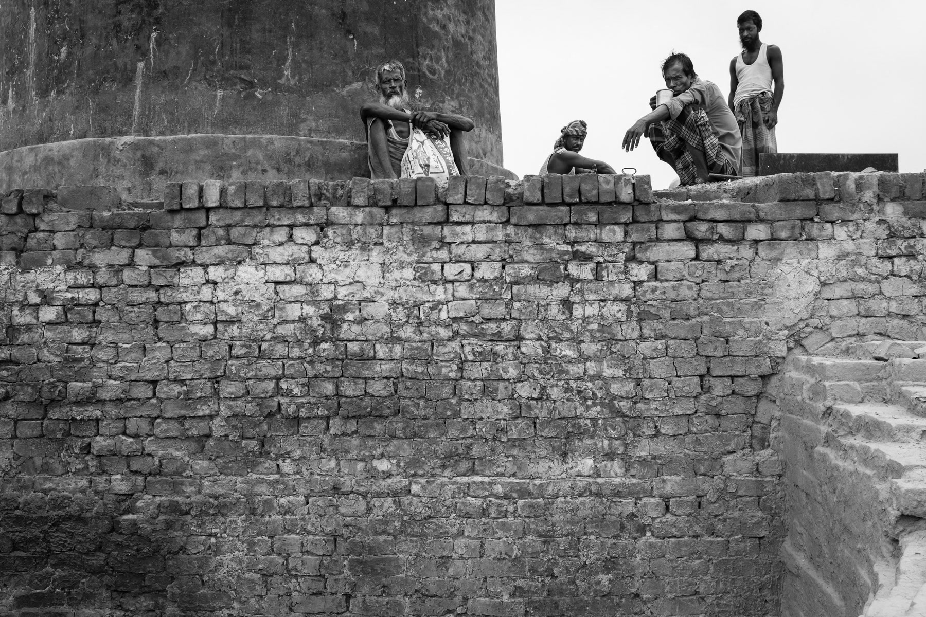 Workers resting on top of the brick kiln, Mymensingh, Bangladesh, May 2015