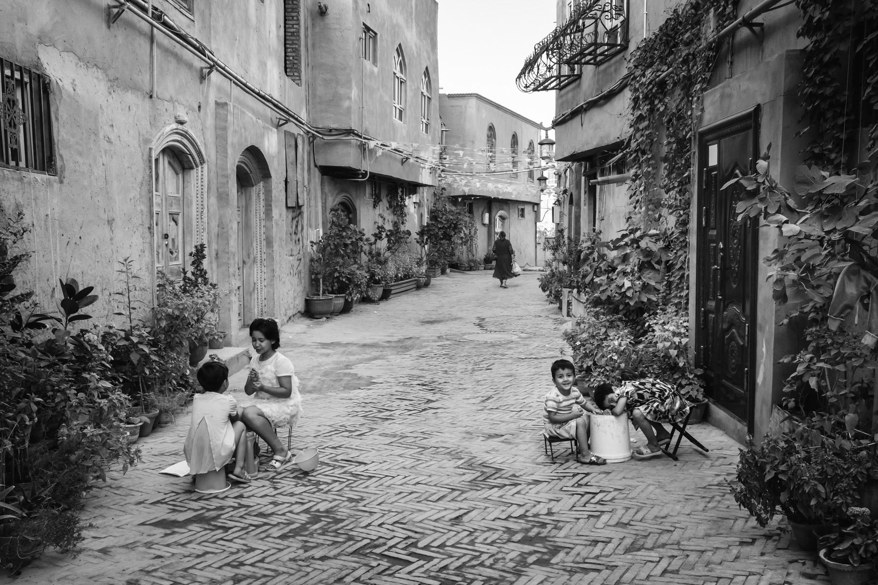 The "new" old town of Kashgar. The old town was completely renovated and rebuilt, many neighbourhoods got razed and replaced by new housing projects keeping the look of the old town architecture. Kashgar has a large majority of Uyghur residents. Xinjiang, China, September 2019