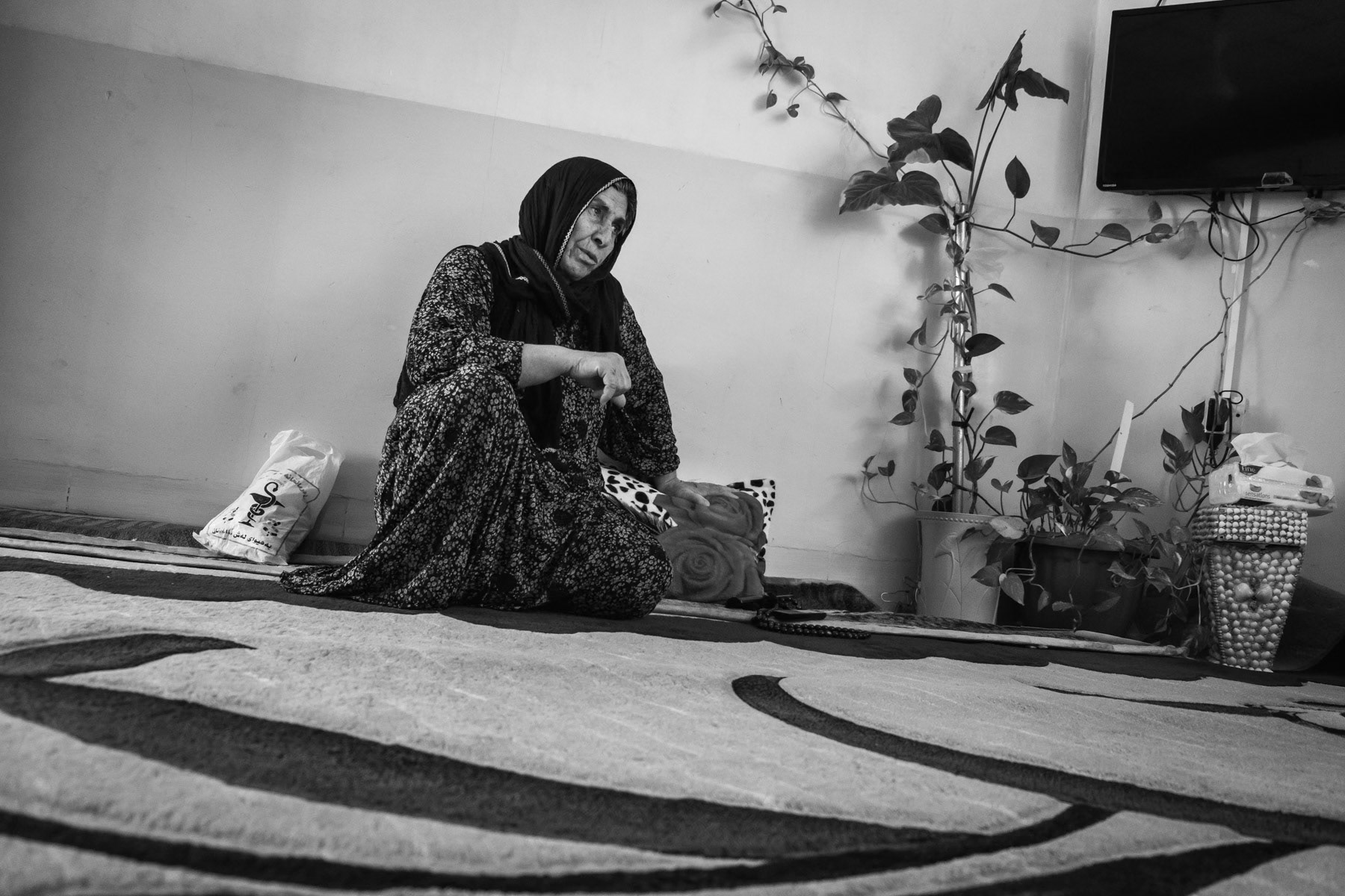 Fatima lost 10 family members, including 5 childen and her husband. One son and 2 daughters survived the attack and do still have serious health problems 30 years after the chemical attack. Fatima has as most victims severe respiratory, skin and eye problems and spends most of her 300 usd pension on medication. The quantity of medication has an adverse effect on her digestive system causing further pain. She regrets the lack of social activities and support for victims but considers herself fortunate to have grandchildren and to see them grow. Halabja, Kurdistan, Iraq, August 2018