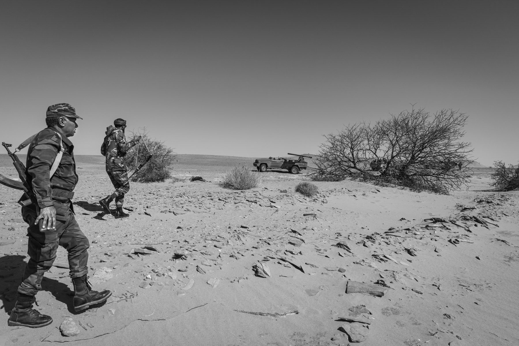 Sahrawi soldiers preparing to move towards frontline positions near 2,700 km long sand wall, built by Morocco, dividing the Western Sahara between the Moroccan controlled territories and Sahrawi liberated territories. Undisclosed location behind the frontline in the liberated Sahrawi territories, Sahrawi Arab Democratic Republic, October 2021