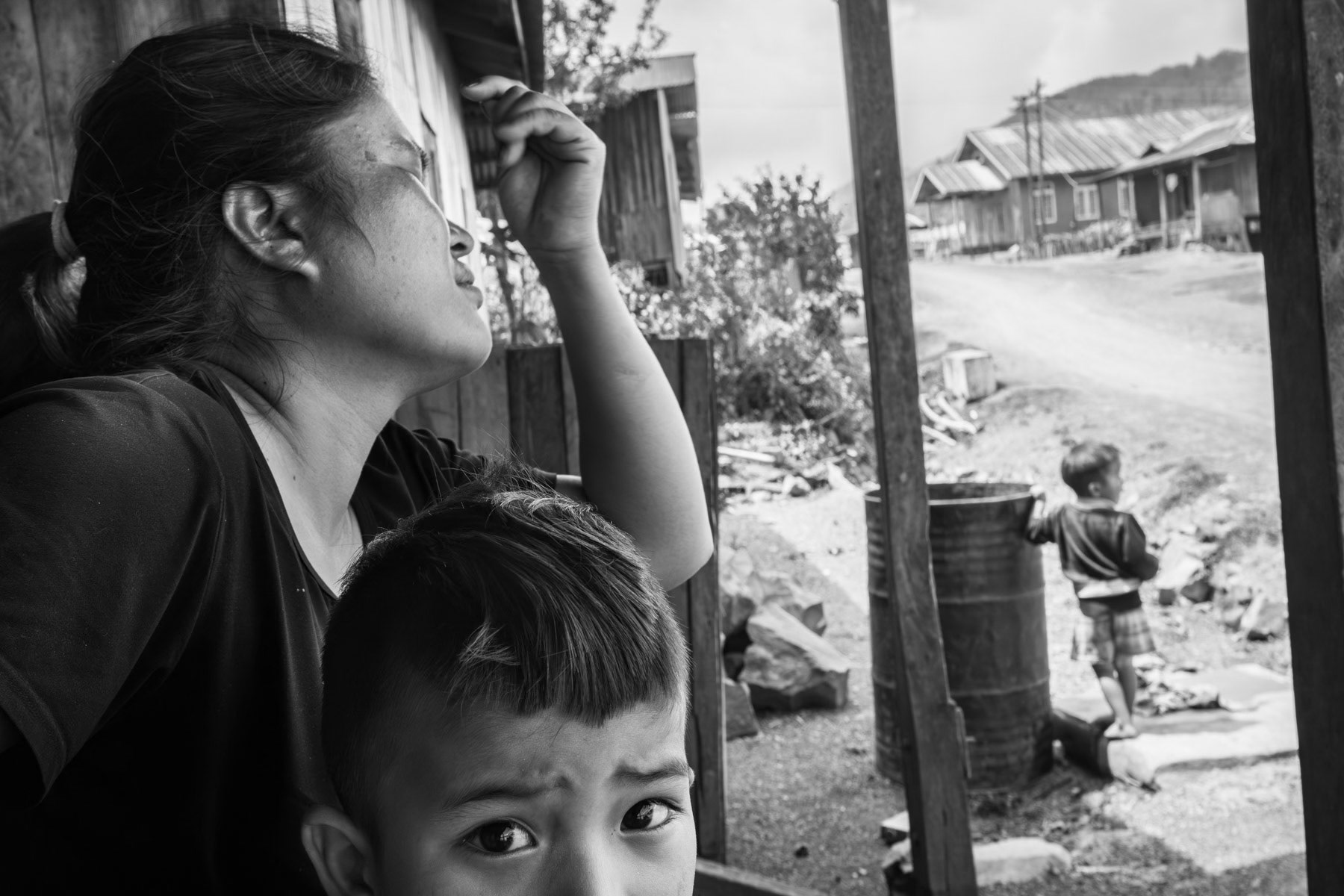 Internally displaced family from Thantlang, a town that has been totally destroyed and where heavy fighting between the Chin National Army and the Myanmar military is ongoing. The villages around Thantlang township where most people took refuge are also unsafe and very often targetted by airstrikes. Thangklua village near Thantlang, Chin State, Myanmar. June 2023