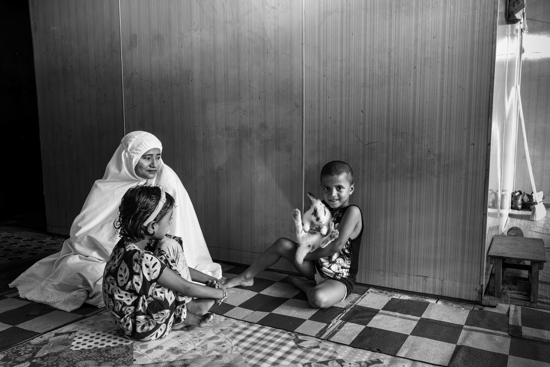 Nur Kolima, from Phen Daw Phin village near Maungdaw, fled Myanmar in May 2025 with her two children—an eight-year-old daughter and a six-year-old son—after months of intensified fighting between the Myanmar military (SAC) and the Arakan Army. Her husband, Rafik, had already escaped in December 2024 after being tortured, travelling through Malaysia before reaching Indonesia. Nur and the children initially intended to flee to relatives in the Bangladesh refugee camps, but after crossing the Naf River they were intercepted by traffickers and forced onto a boat. Upon arrival in Dumai, Indonesia, she was separated from her children and threatened until payment was made. The family has since been reunited, but all remain deeply traumatized by the violence in their home country and the ordeal of being trafficked. Pekanbaru, Indonesia, October 2025