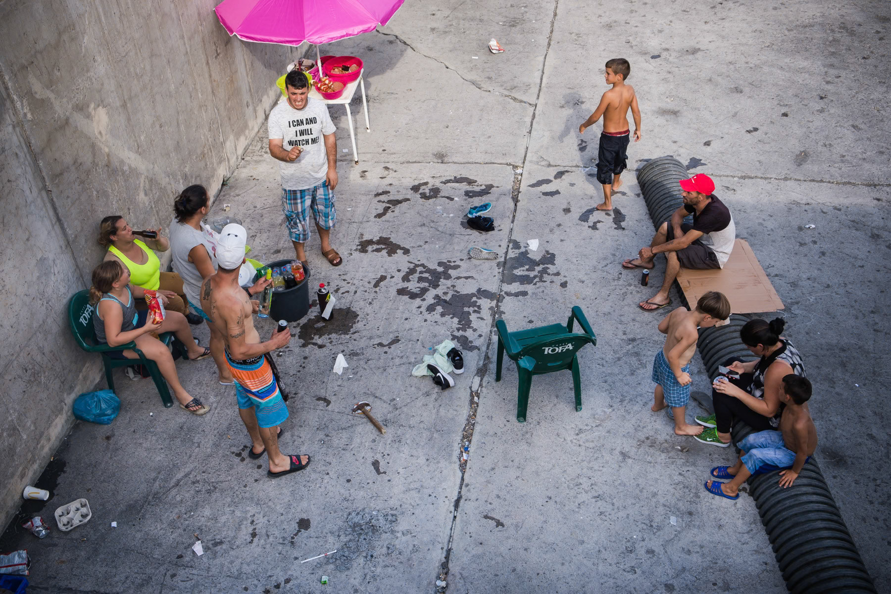 Fishermen families gathering for a weekend barbecue on the docks. Rabo de Peixe, Azores, September 2018