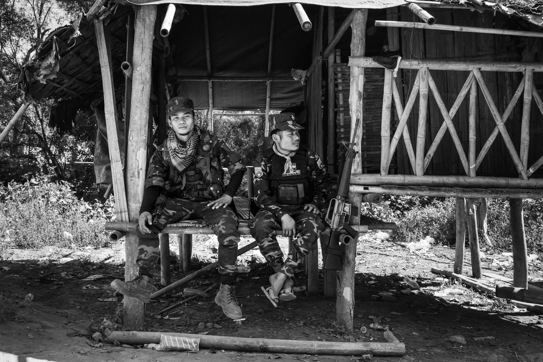 Members of the Karen National Liberation Army (KNLA). The KNLA is a Karen ethnic army that has struggled against the military regime for the past 70 years in order to safeguard the freedom and dignity of the Karen minority living in Burma. Htaw IDP camp, Kayin State, Myanmar, January 2024