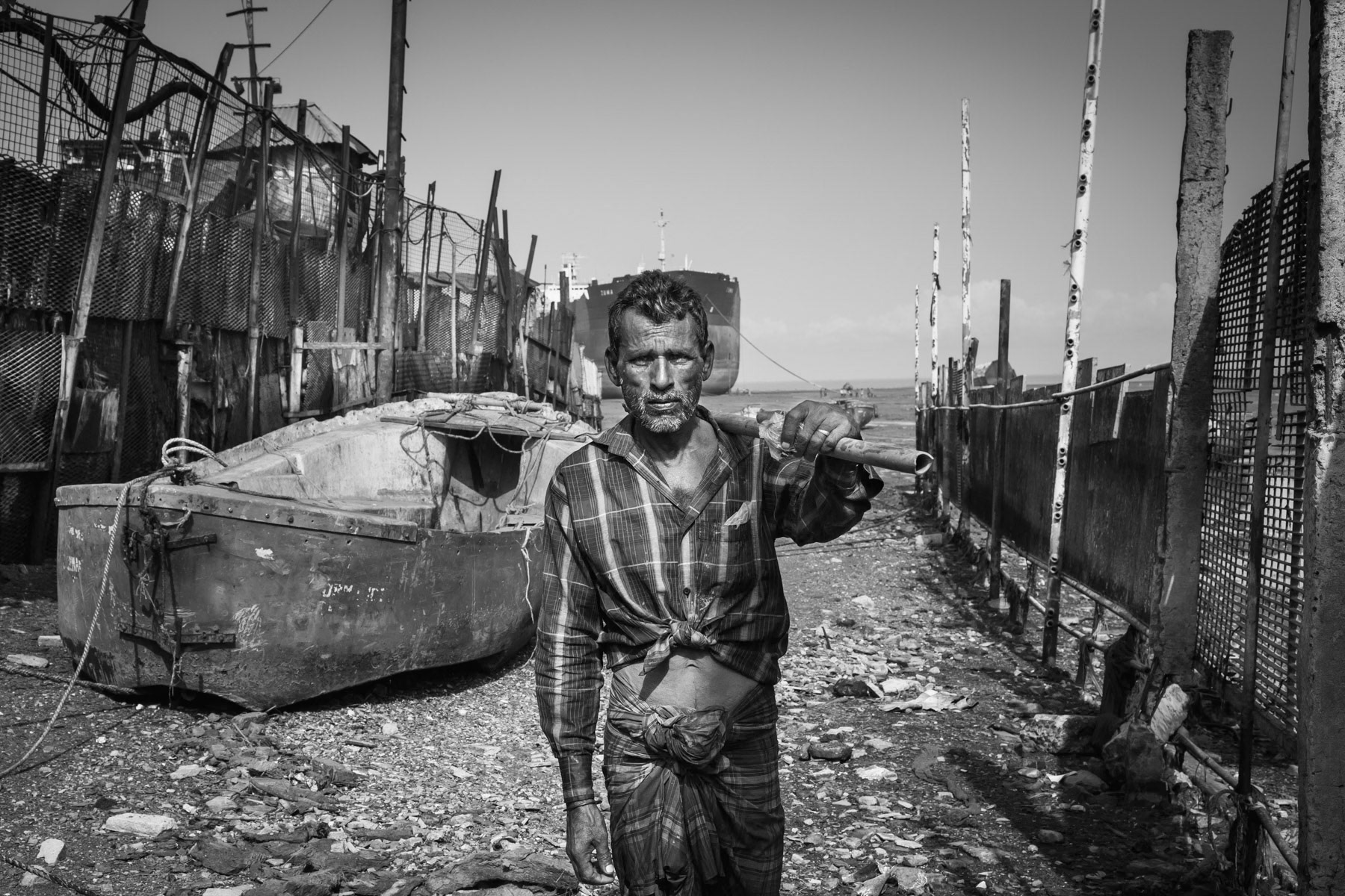Passage between two ship-breaking yards used by local communities to access the sea and fish. Sainbolt, Chittagong, June 2015