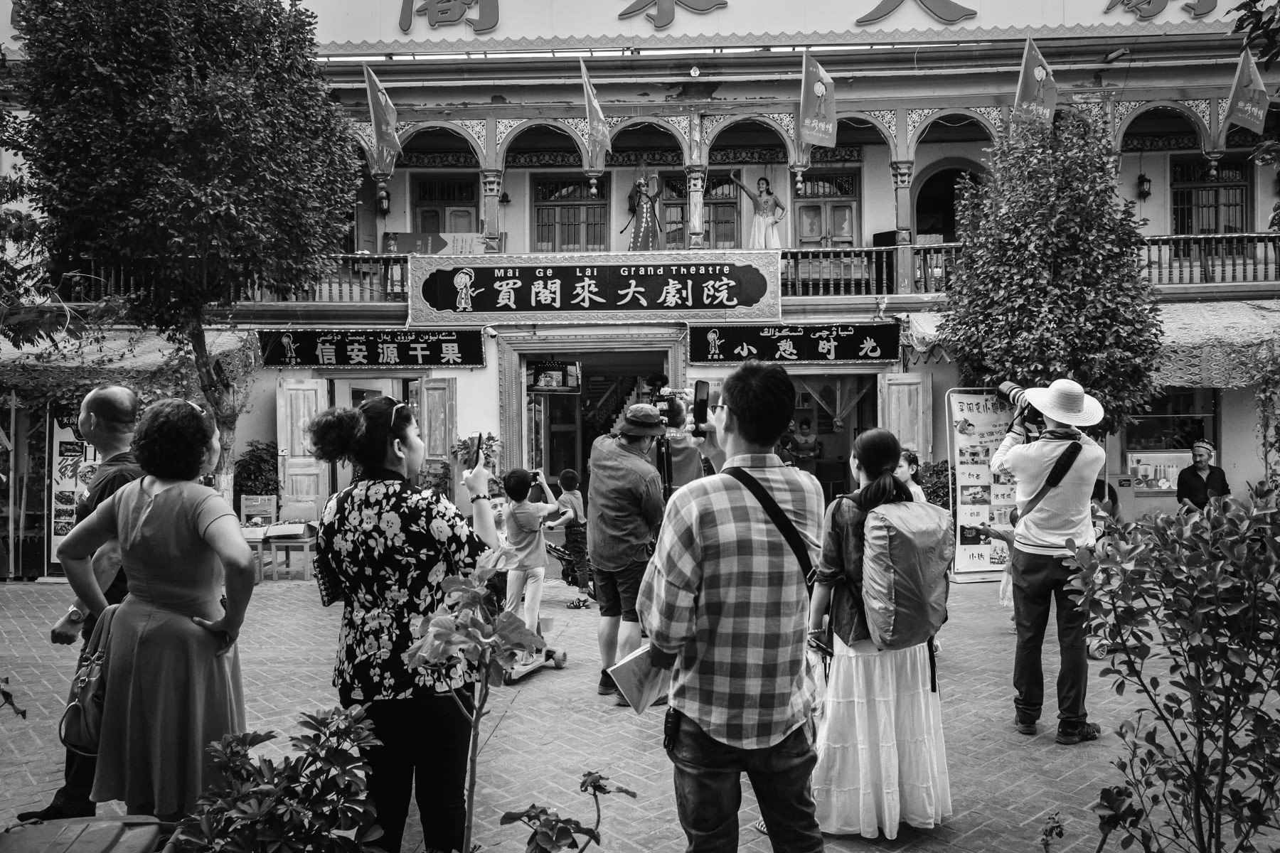 Uyghur dancers performing for the ever increasing hordes of Han Chinese tourists that visit the Western Province of Xinjiang. The old city of Kasghar has a real artificial Uyghur culture and Silk Road feeling that remain very different of how the general Uyghur population is living and treated. Kashgar, Xinjiang, China, September 2019