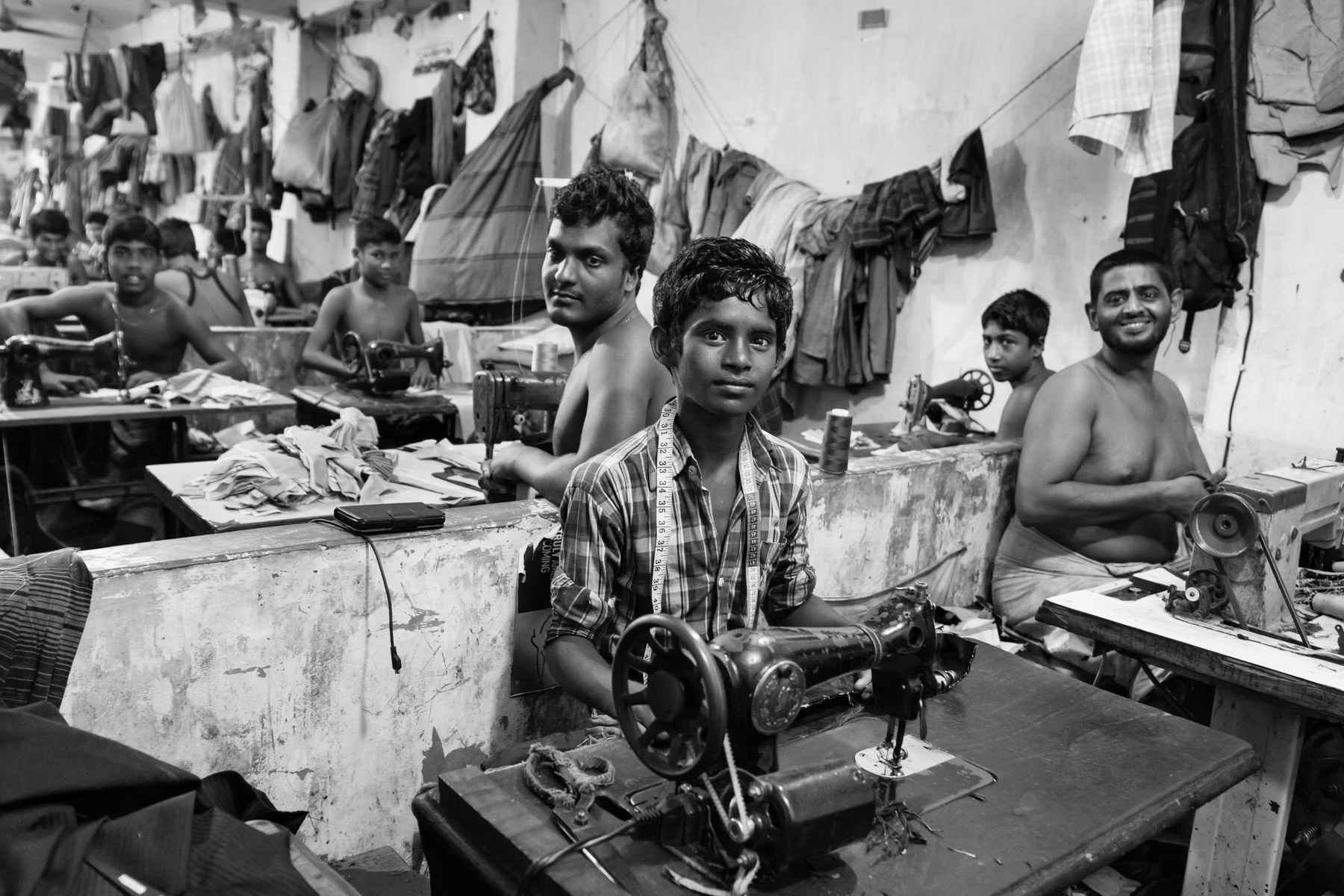 Workspace on the top floor of a high building where temperatures soar above 40 degrees during the 14 hours long shifts. Garment factory in Dhaka, Bangladesh, May 2015
