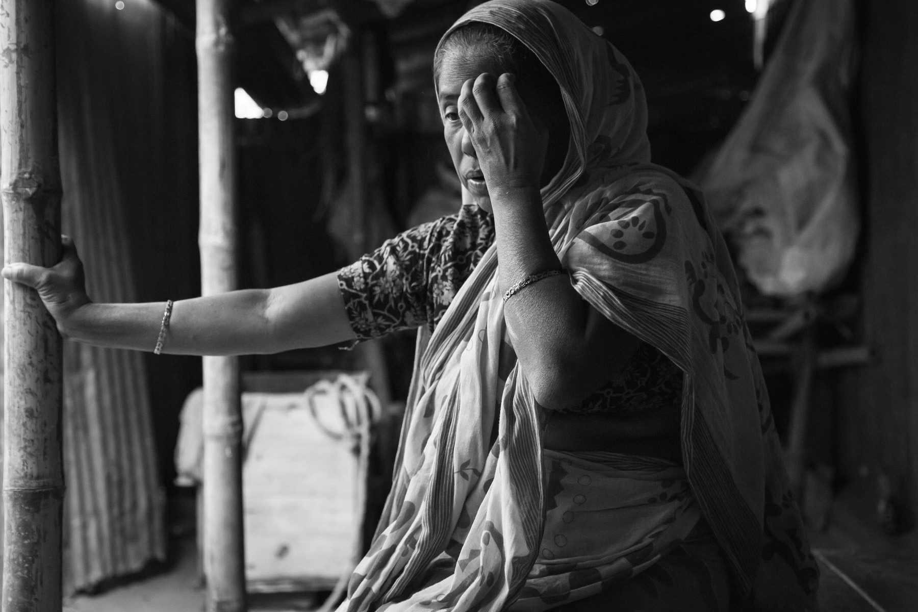 Ms Akthat, spinal cord injury patient at home in her village, Dostika in Bogra district, Bangladesh, October 2014