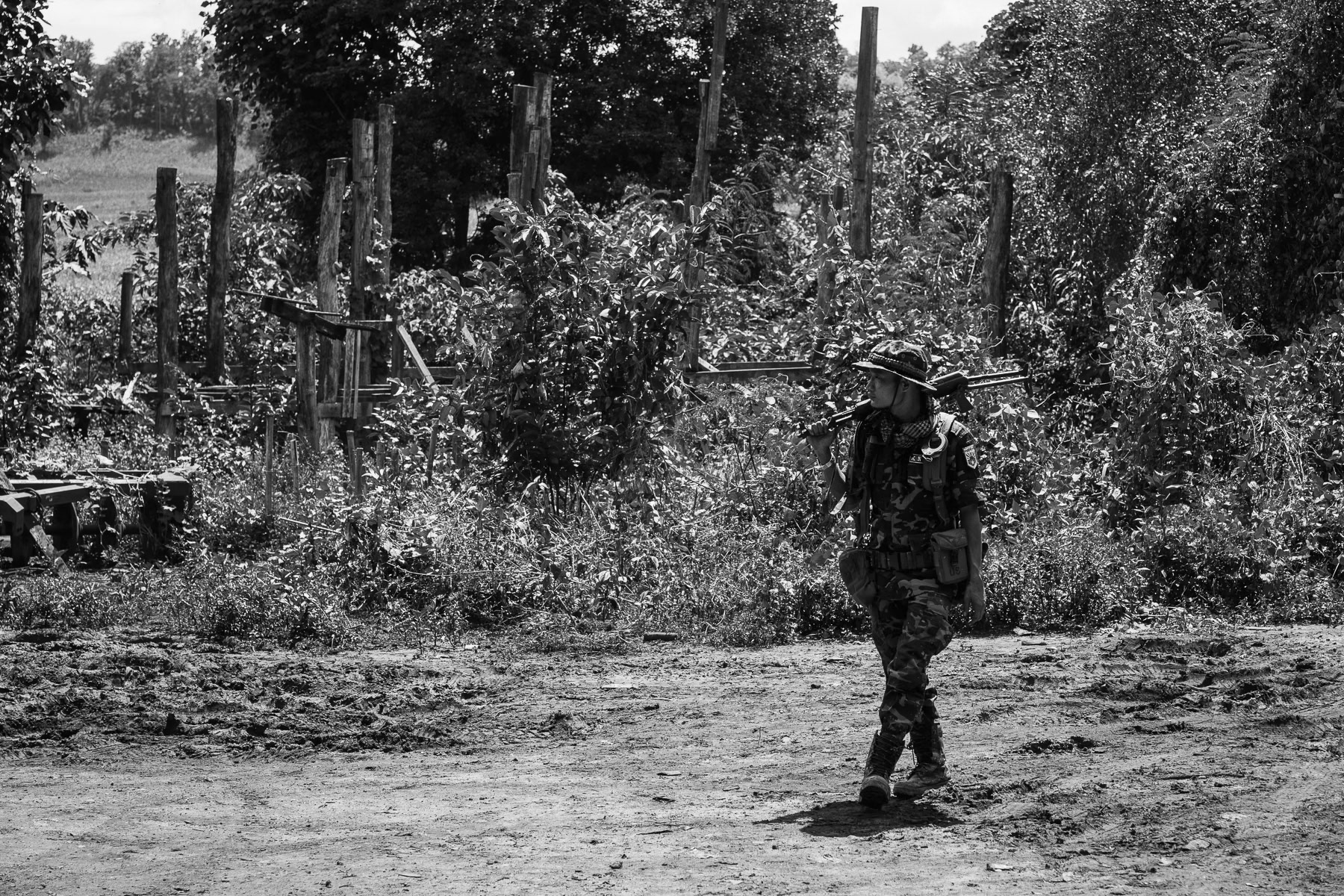 Karen National LIberation Army (KNLA) soldier returning from the frontline. Frontline near Kanele in Karen State, Myanmar, September 2024