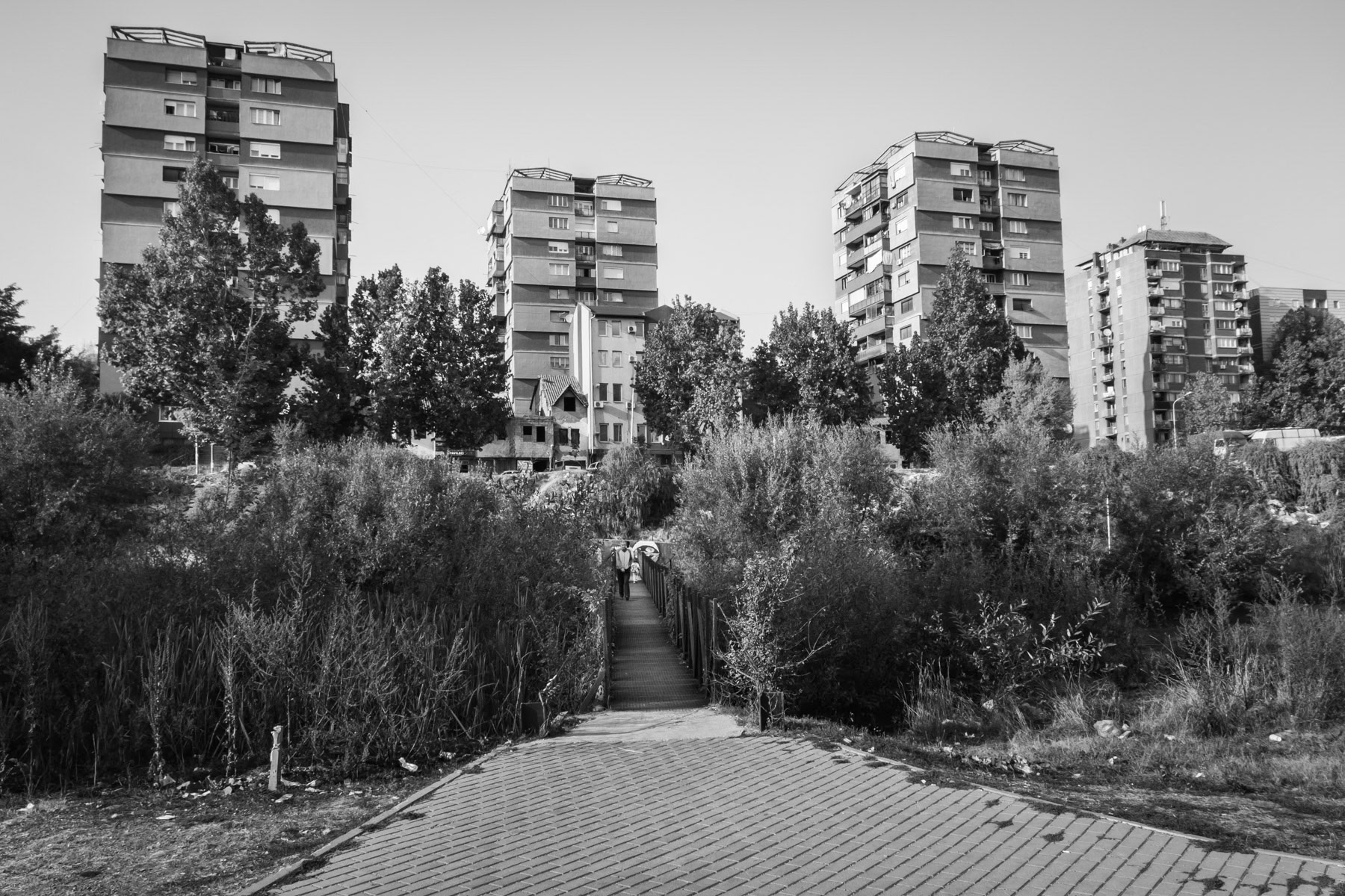 Appartment blocks in the Serbian part of the city on the demarcation line and Ibar river separating the Serbian and Albanian population of Kosovska Mitrovica, Northern Kosovo, October 2018