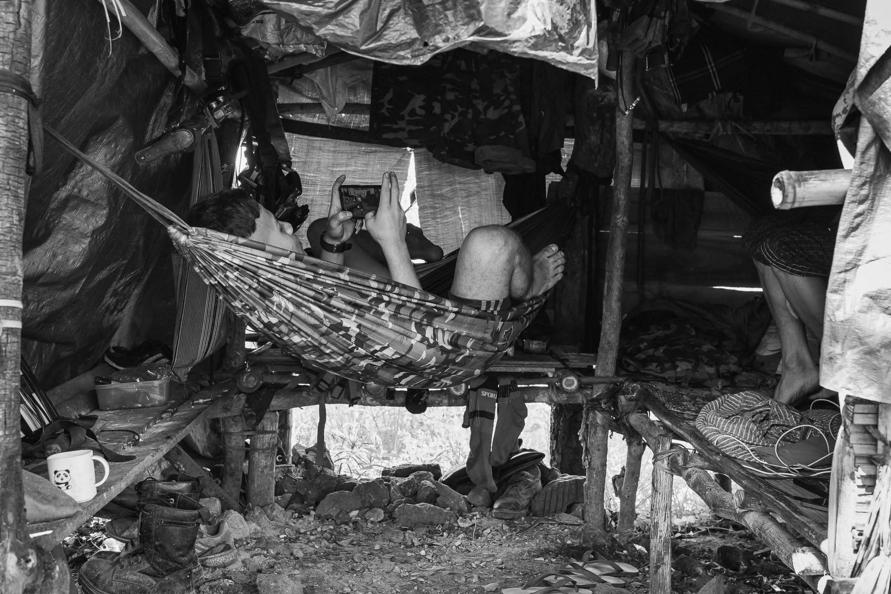 KNLA soldier resting at a frontline position, Karen State, Myanmar, September 2024