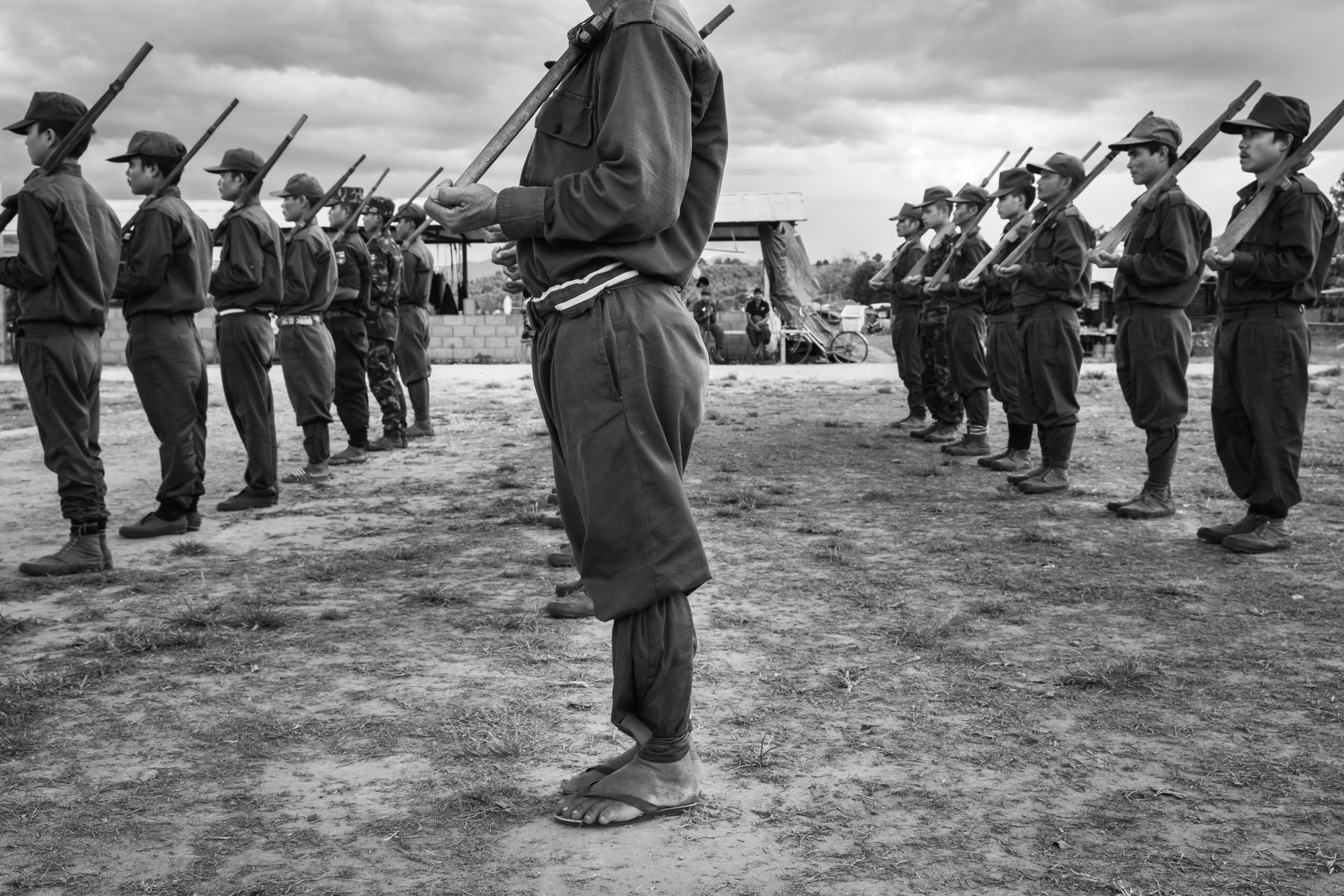 Democratic Karen Buddist Army (DKBA) parade repetition with wooden nep guns. Kayin State, Myanmar, November 2018