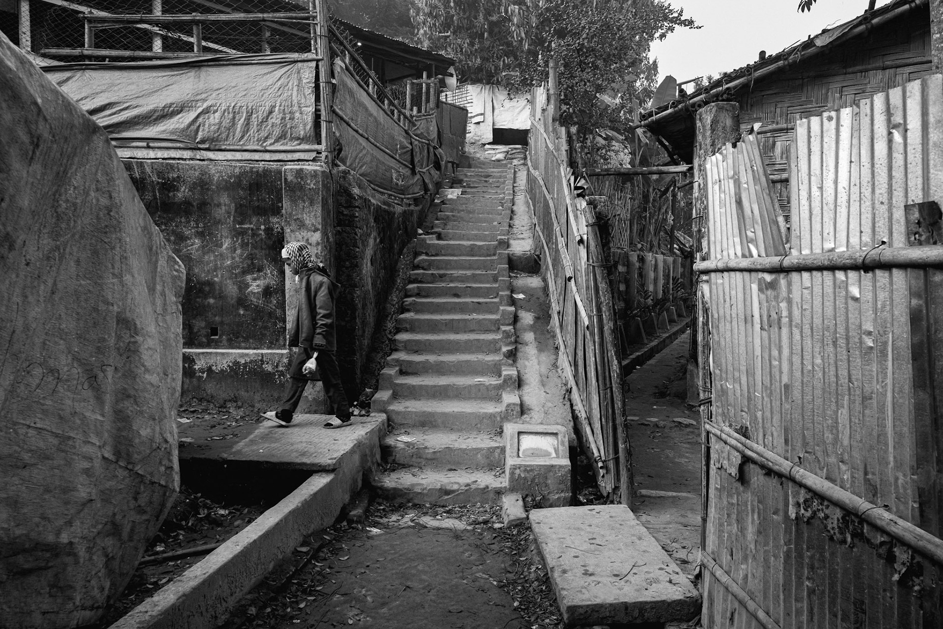 The vertical expansion of the camps is a direct result of the lack of available flat land to house the ever-growing refugee population. Balukhali camp, Bangladesh, January 2026