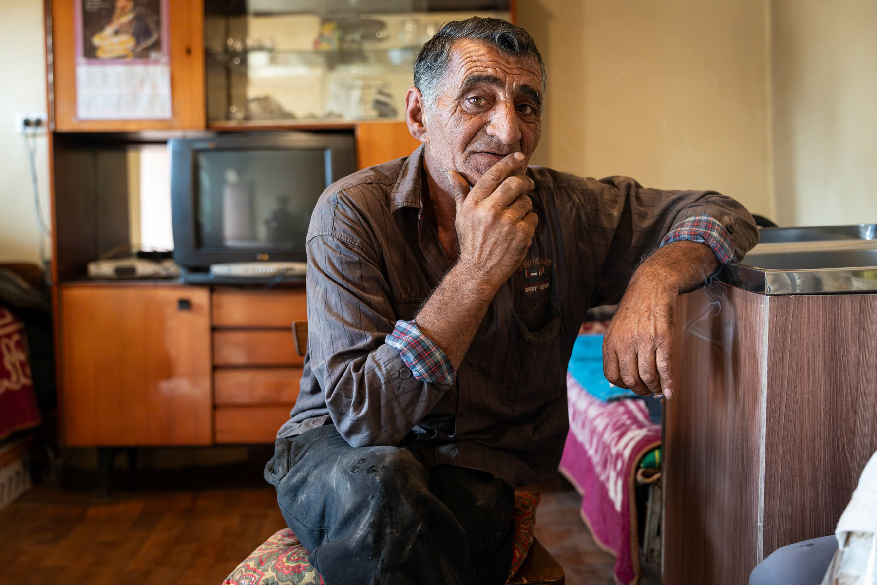 Genarik, in his house in Khantsakh, a village on the new front line between Azerbaijan and Armenia since the 2020 Nagorno-Karabakh war. The residents of these border villages feel abandoned and left to fend for themselves, with very few public services available to them. Syunik, Armenia, September 2025