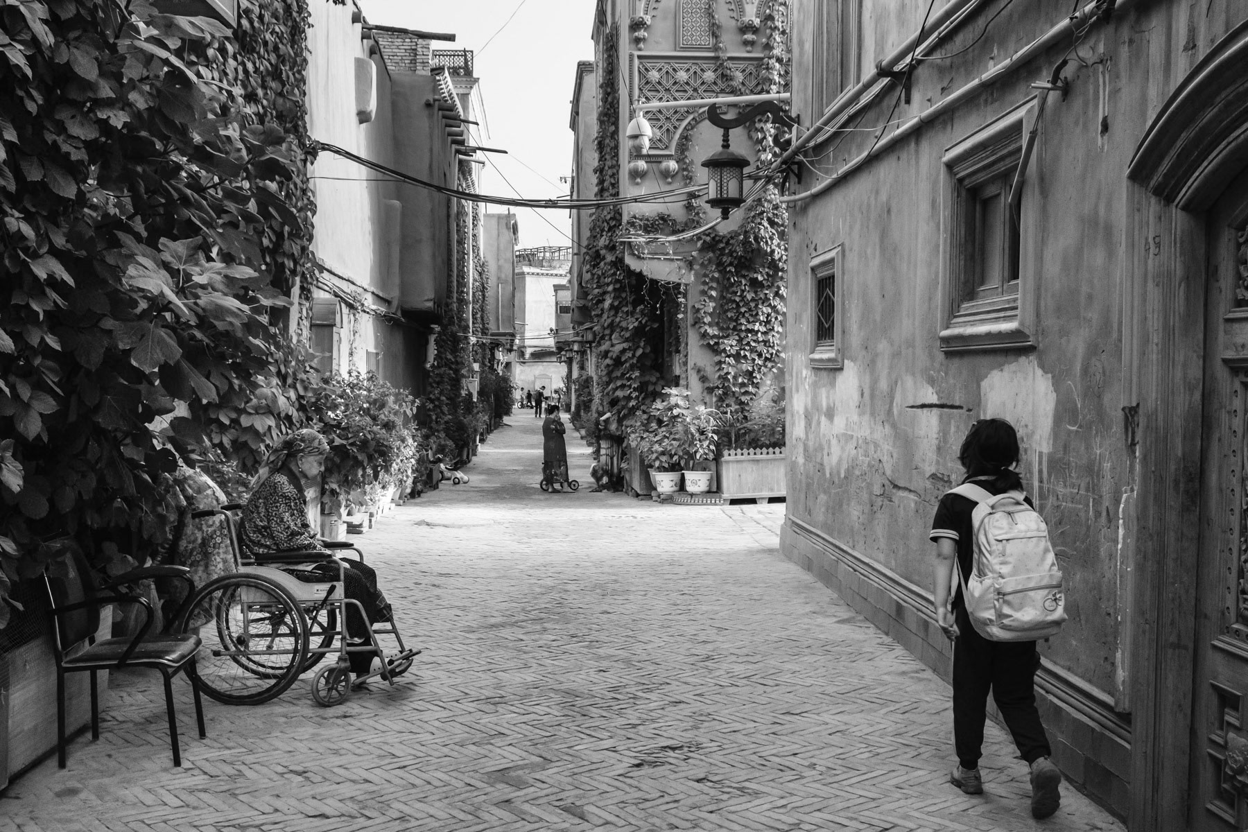 The "new" old town of Kashgar. The old town was completely renovated and rebuilt, many neighbourhoods got razed and replaced by new housing projects keeping the look of the old town architecture. Kashgar has a large majority of Uyghur residents. Xinjiang, China, September 2019