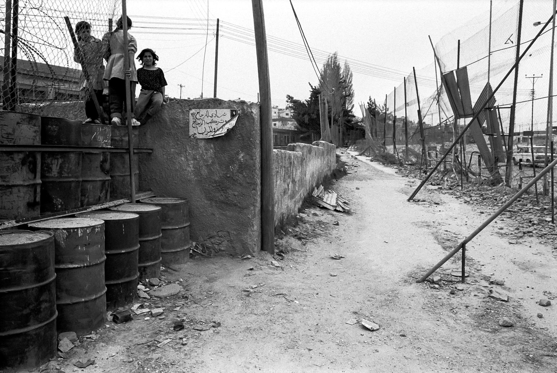 Outer fence along the main road, Dheisheh refugee camp in Bethlehem, West Bank, 1993