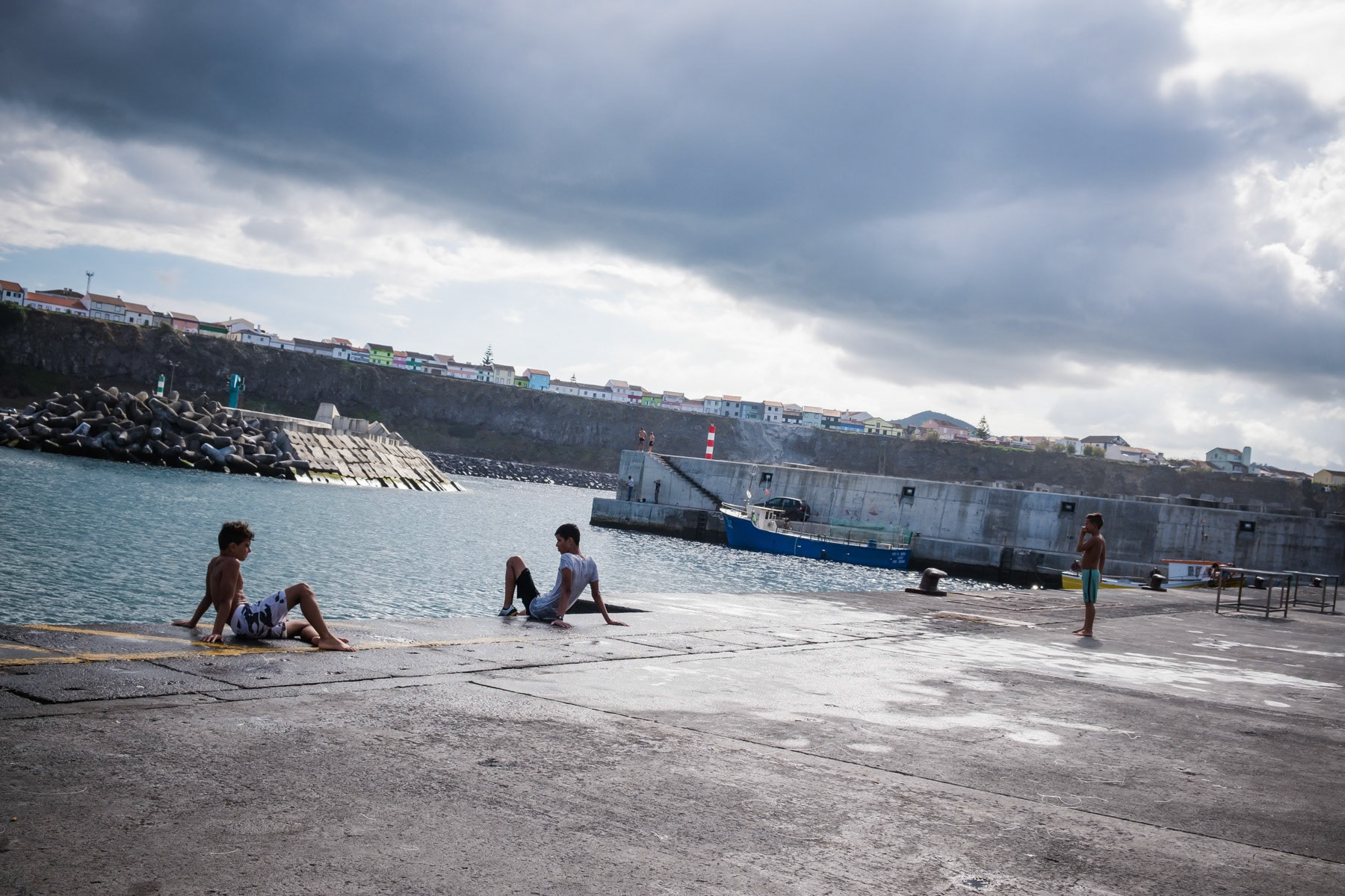 Rabo de Peixe meaning "Tail of the Fish" is a town on the island of São Miguel in the Portuguese archipelago of the Azores. The economy is driven by fisheries and ancillary industries like fish-processing. The fishermen and their families live in a small neighborhood near the port and live from and with the Sea. Fishing dock, Rabo de Peixe, Azores, September 2018