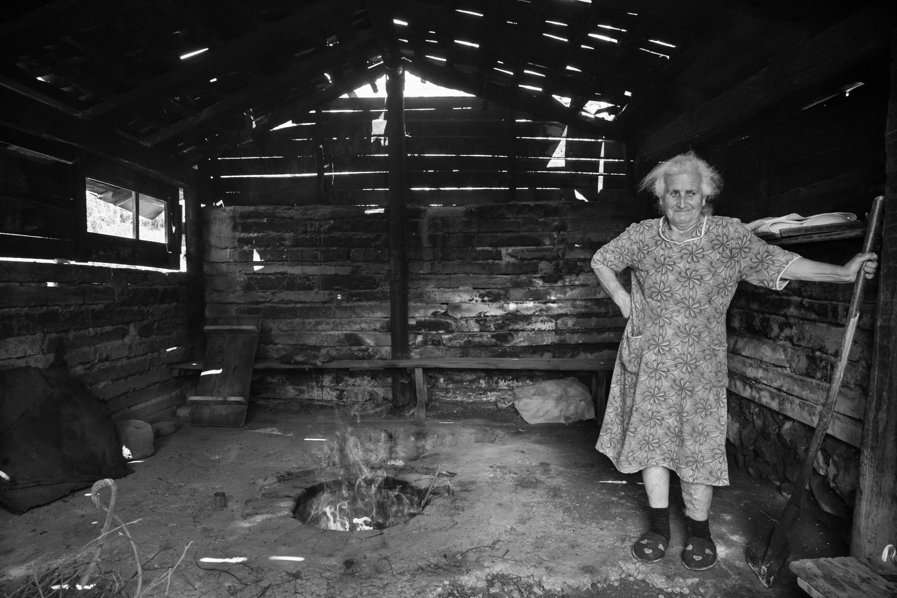 Preparing fire in the public oven, Taghlar village in Hadrut region, Karabakh, July 2014