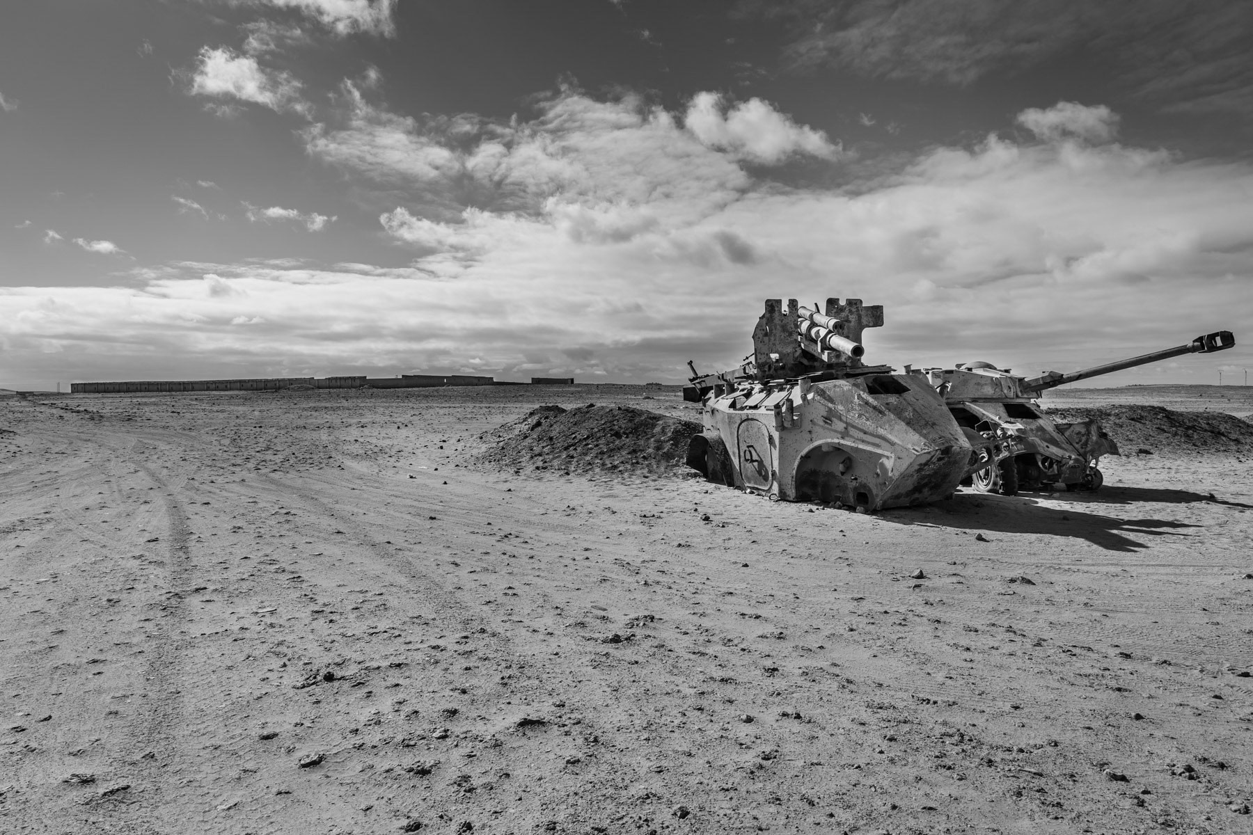 Remainder of a Moroccan tank captured during the liberation war between the Polisario and Morocco in 1975-1991. An area in South Western Algeria is allocared to the Polisario, de de facto government in exile of the Western Sahara, a disputed territory occupied for 80% by Morocco since 1976. Between 120 and 150,000 Sahawari refugees live in this desertic area in 5 refugee camps and Rabouni as government and admisistrative center. Rabouni, Tindouf Province, Algeria, December 2019