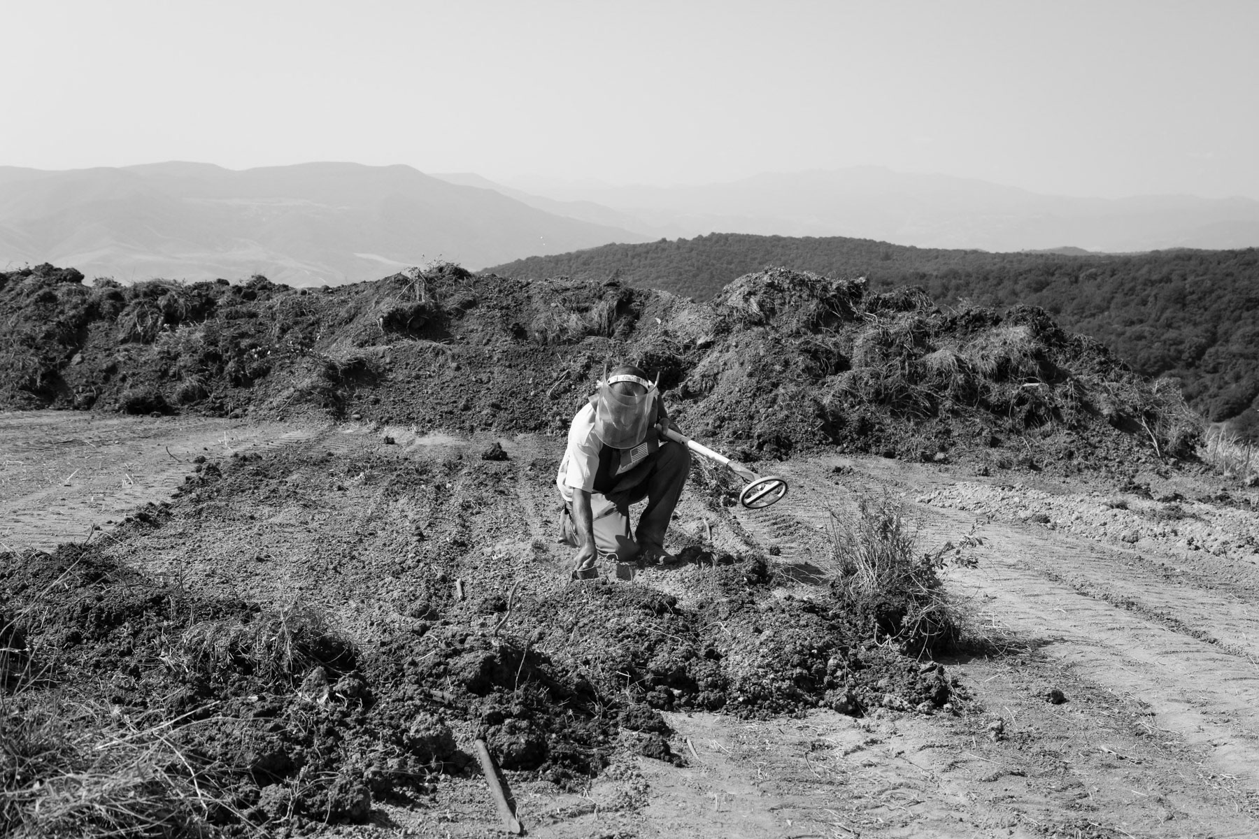 Clearing excavated earth. The HALO Trust at work, Khramort minefields, Nagorno-Karabakh, July 2014