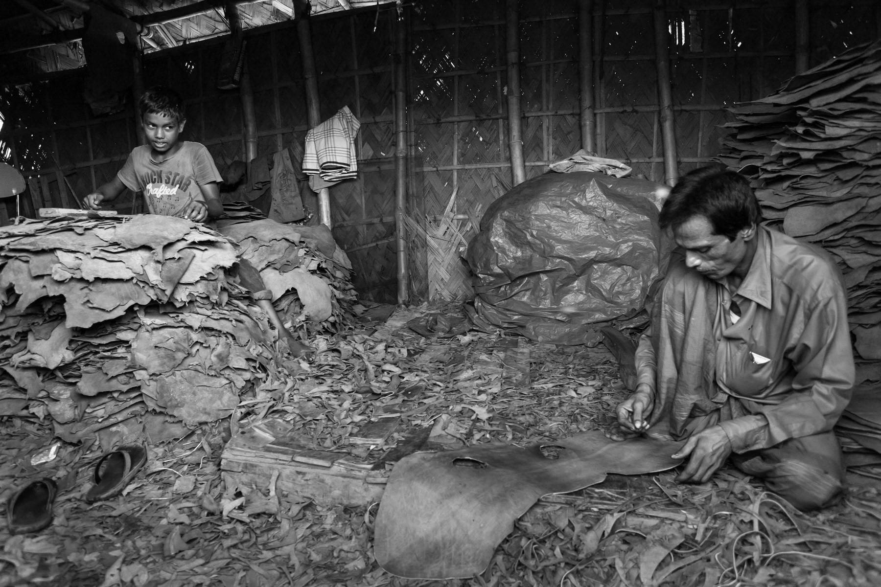 Sole makers, Hazaribagh tanneries, Dhaka, Bangladesh, October 2014