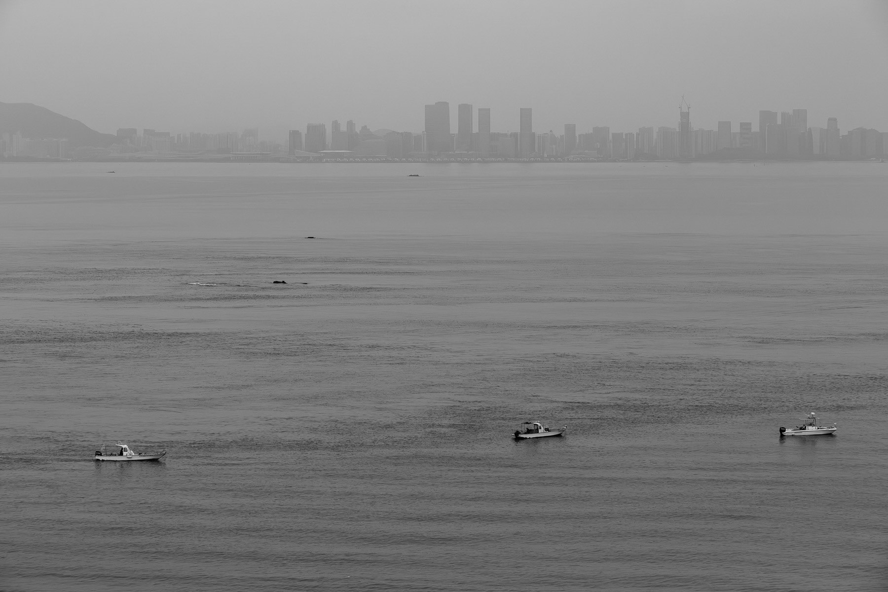 With China looming just across the strait, Kinmen's local fishermen are severely limited in how far they can fish from their immediate shores. Kinmen islands, Taiwan facing Xiamen in China, May 2025