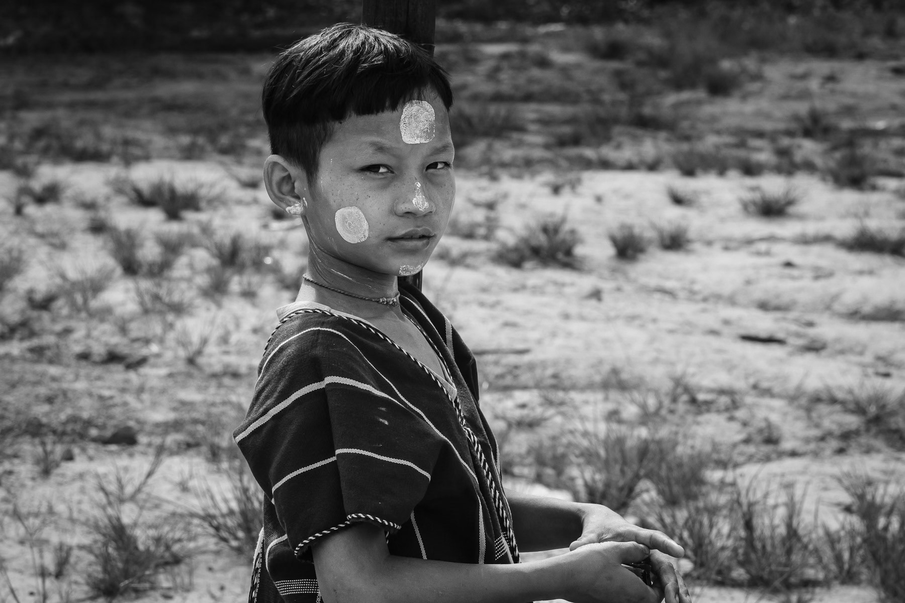 Ethnic Karen girl at a camp for displaced people in Karen State, Myanmar, September 2024