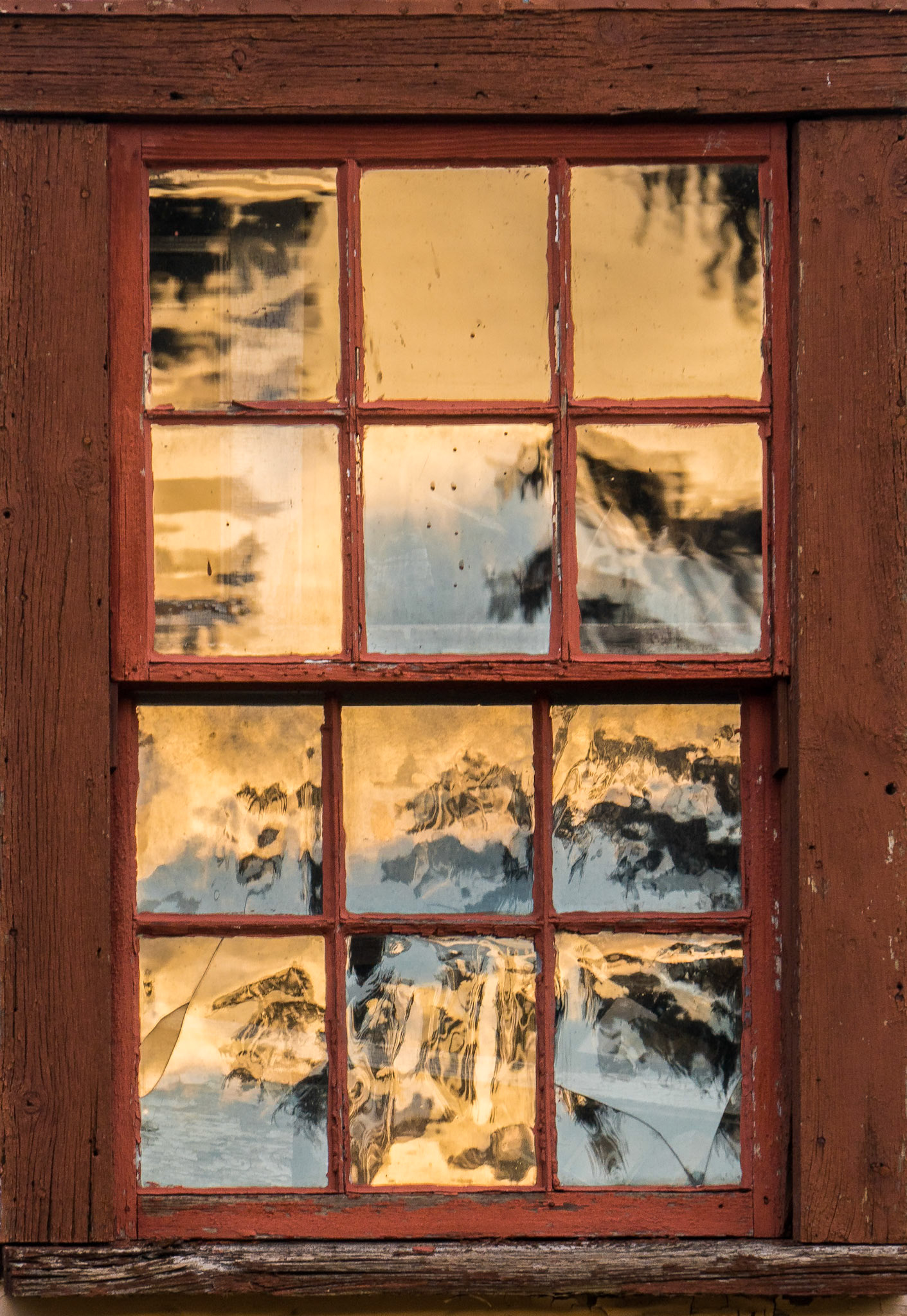 Old Glass Reflecting Sunset