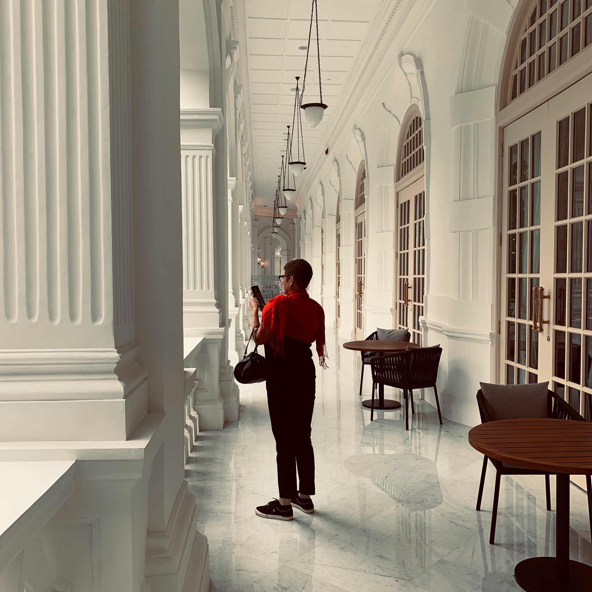 Rooms open onto a covered colonnade, it was sweltering, and Annie has her scarf on.