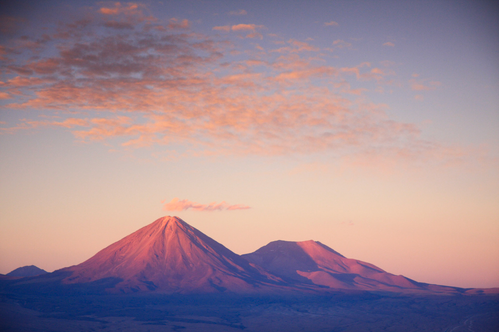 Sunset on Volcan Licancabur from above Valle de le Luna