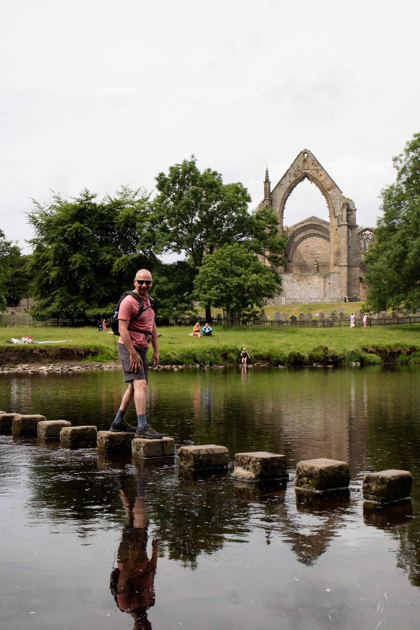 Alex on the stepping stones at Bolton Abbey