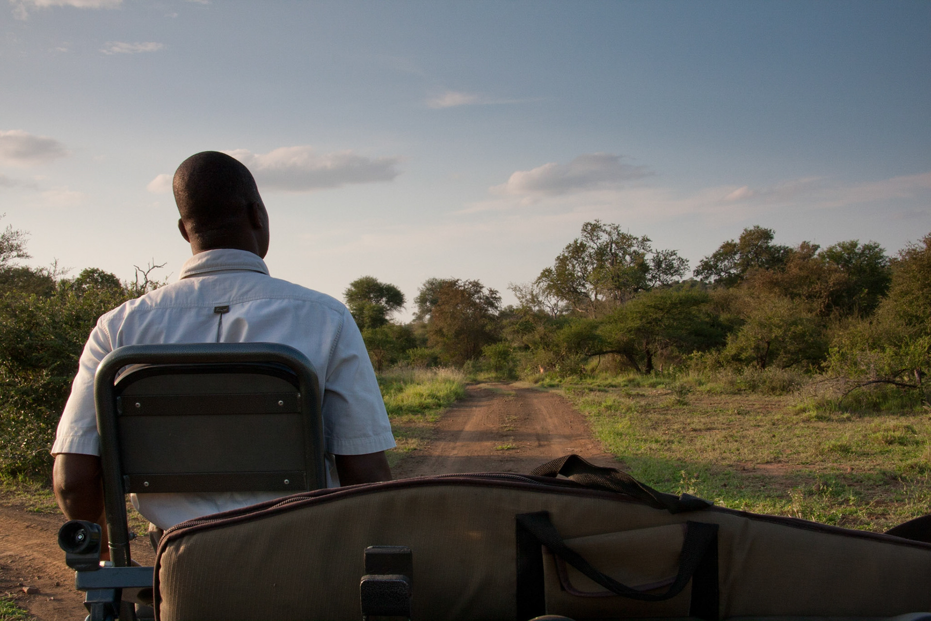Andrew on the front of the Land Rover