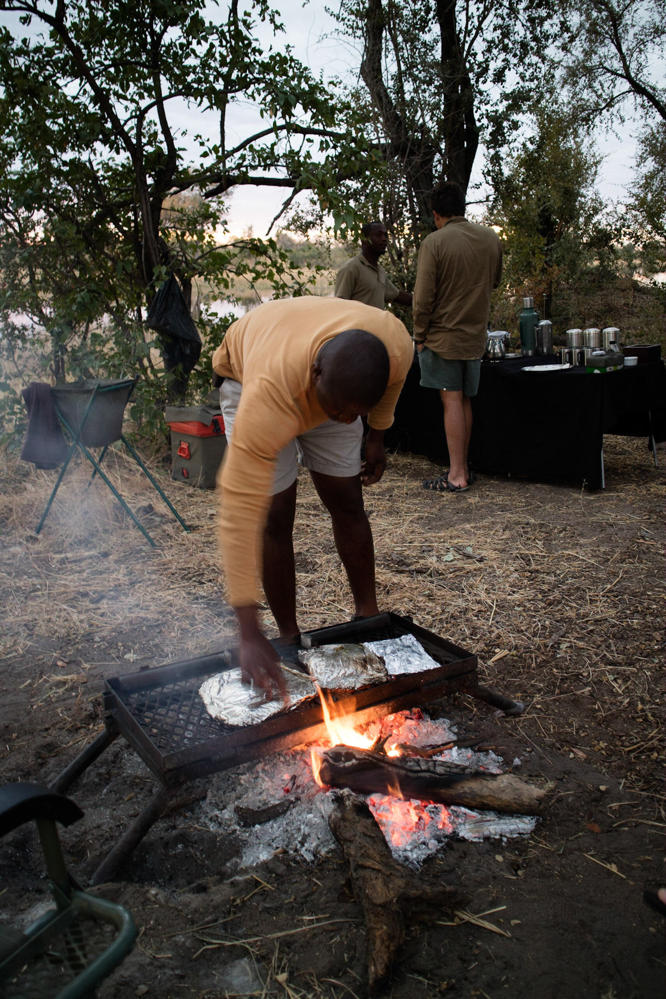 Cooking dinner over the camp fire